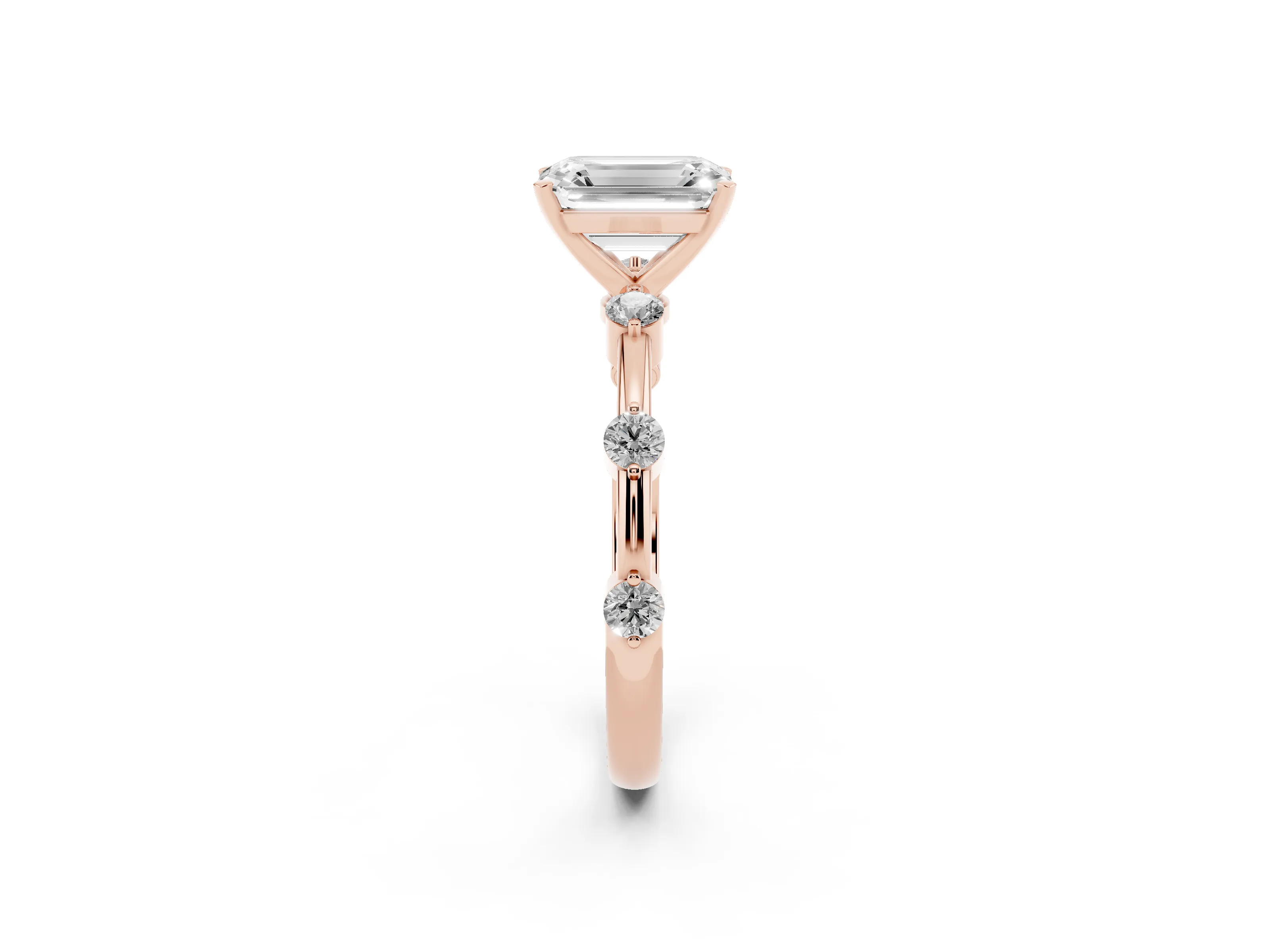 Emerald Cut Diamond Solitaire Ring Set in Rose gold with Bezel Set Side Stones and Prong Setting