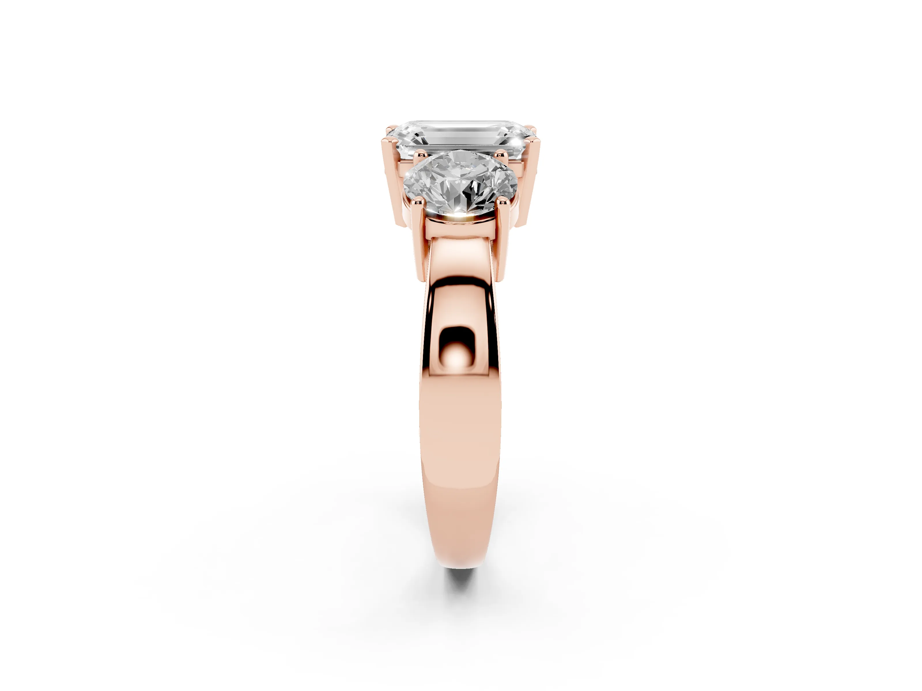 Emerald Cut Diamond Three-Stone Ring Set in Rose gold with Round Side Stones and Classic Band