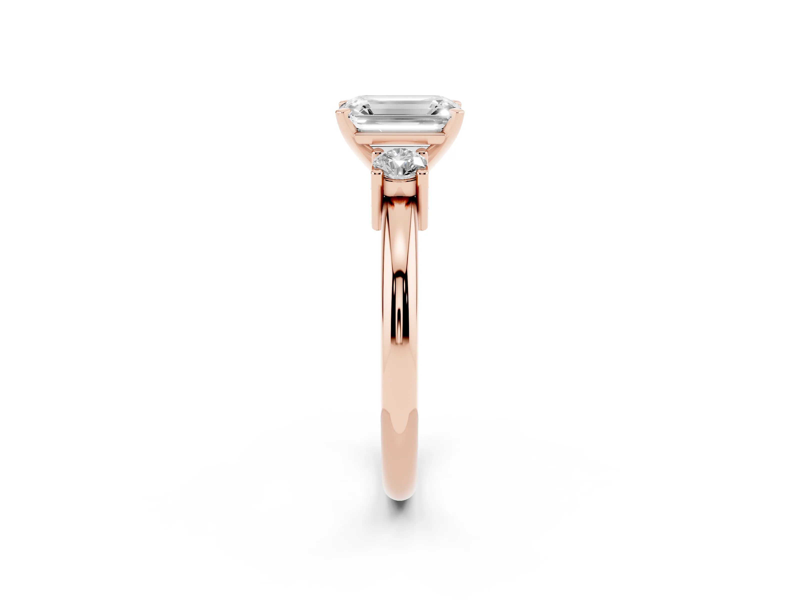 Three-Stone Emerald Cut Diamond Ring Set in Rose gold with Prong Setting and Plain Band