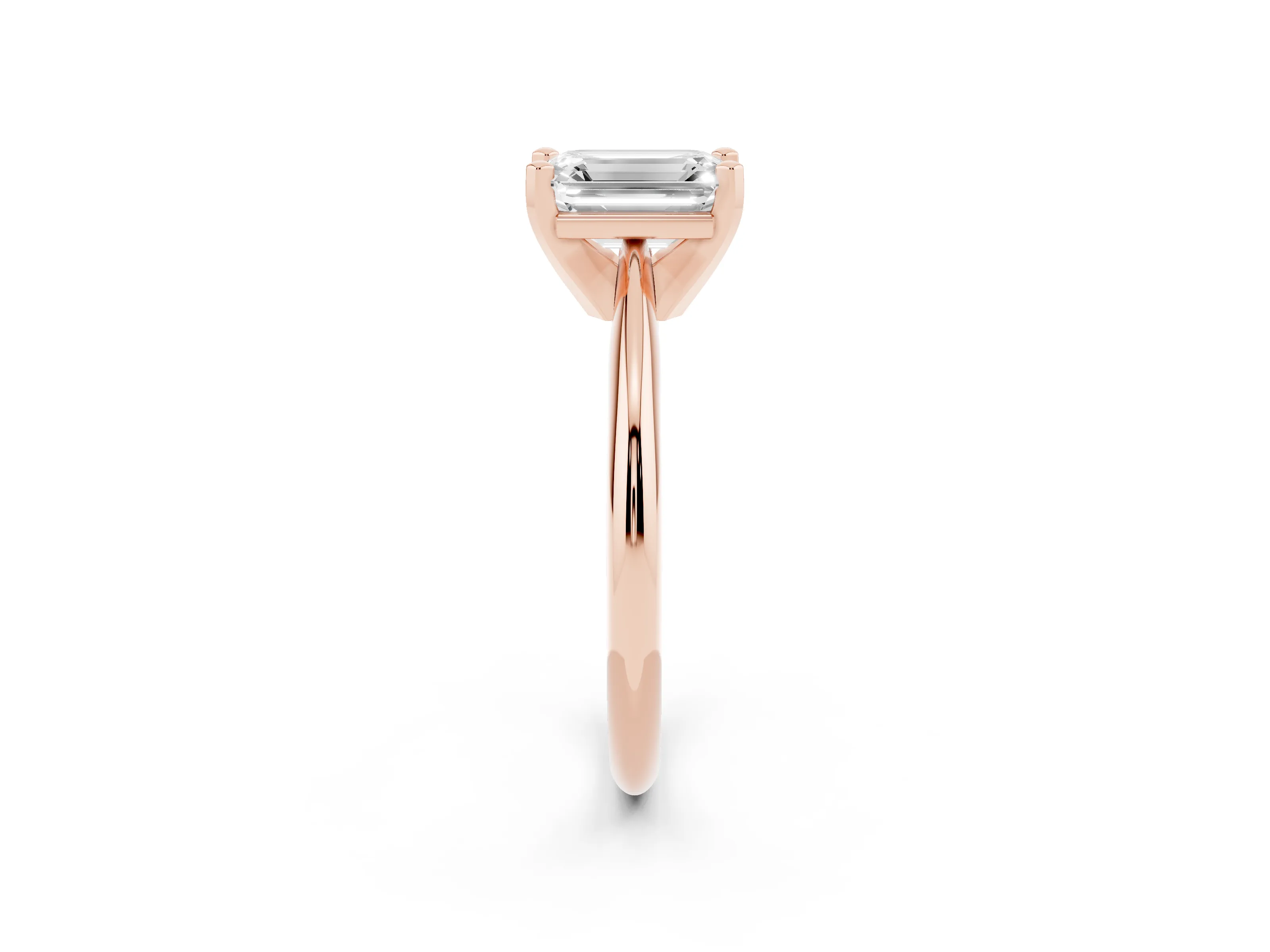 Emerald Cut Diamond Solitaire Ring Set in Rose gold with Prong Setting on a Plain Round Band