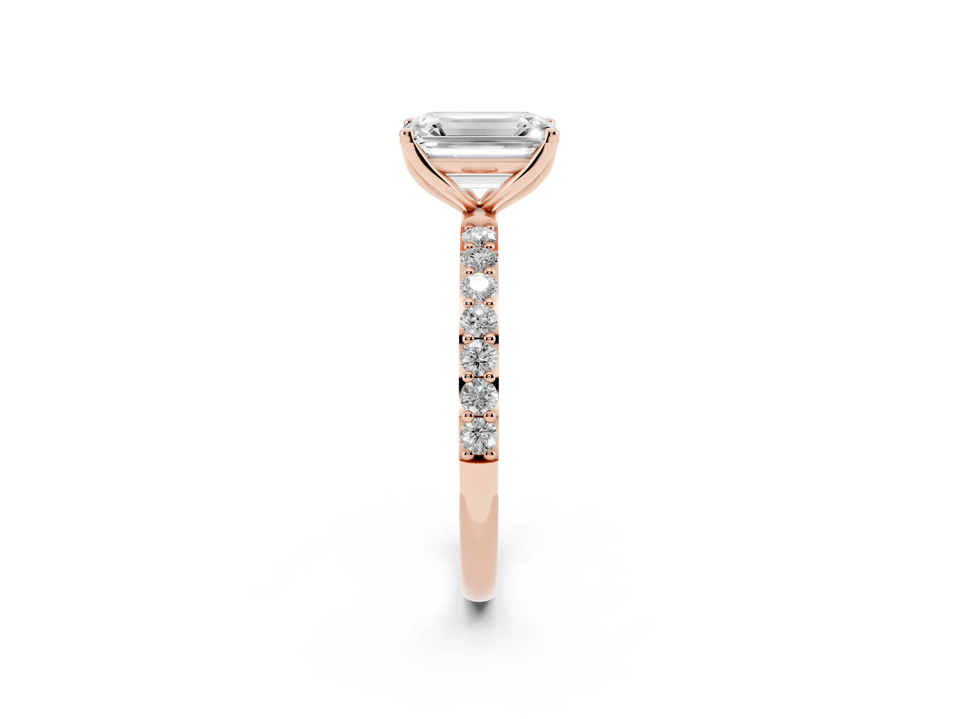 Emerald Cut Diamond Solitaire Engagement Ring Set in Rose gold with Round Pavé Band and Prong Setting