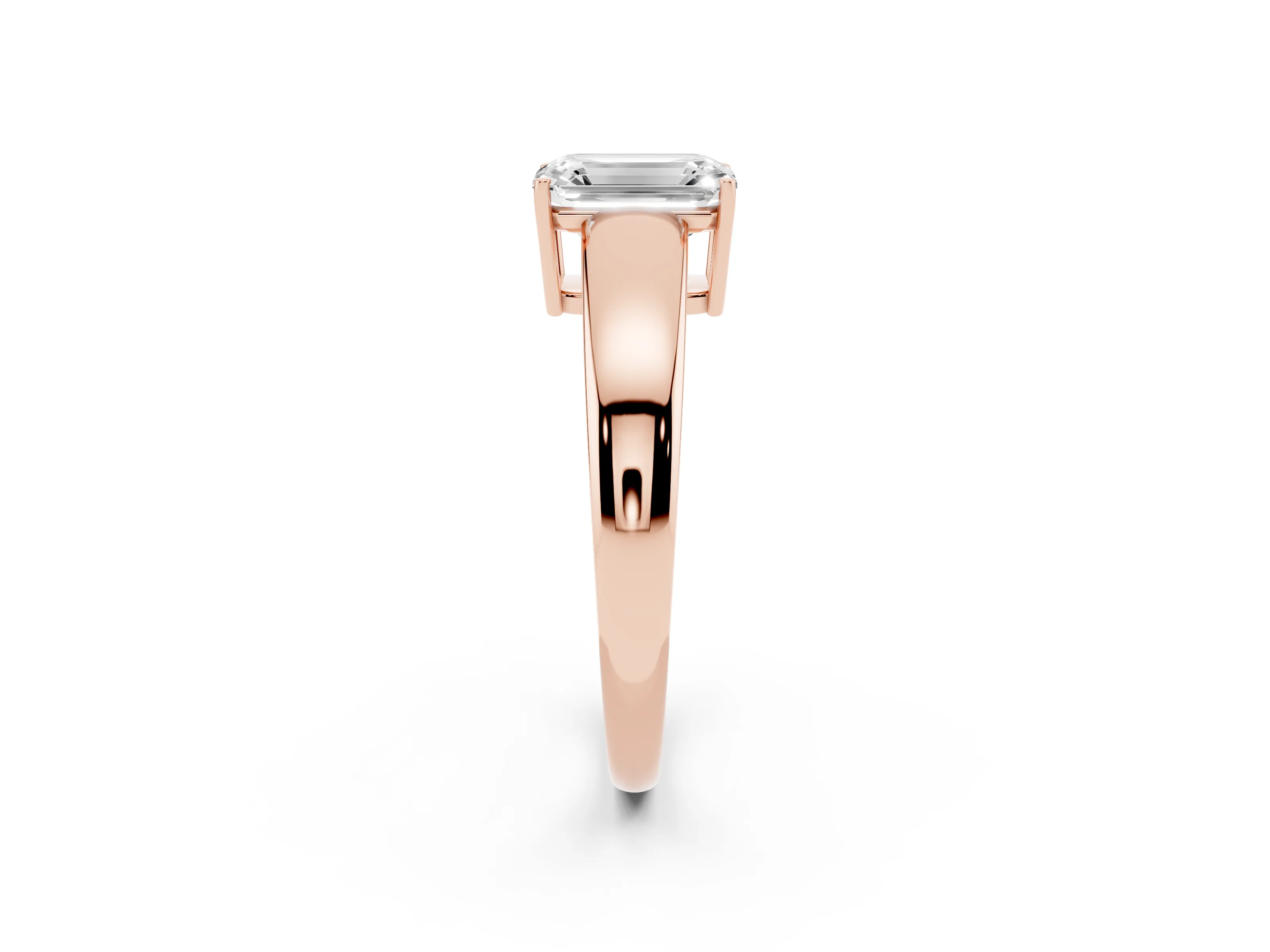 Emerald Cut Diamond Solitaire Ring Set in Rose gold with Tapered Band and Prong Setting