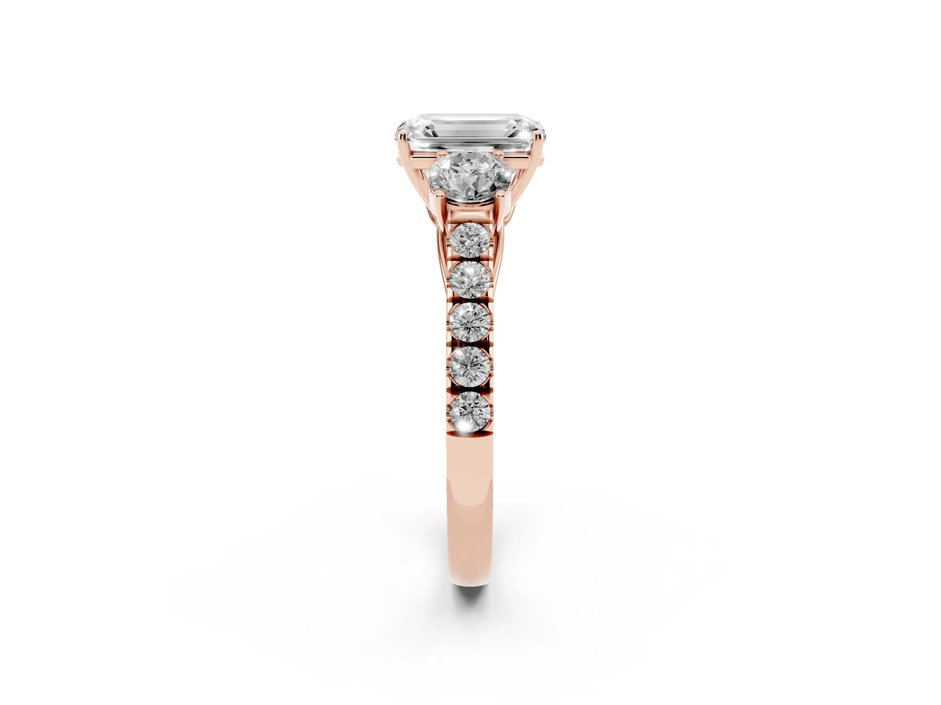 Emerald Cut Diamond Three-Stone Ring Set in Rose gold with Round Side Stones and Delicate Pavé Band