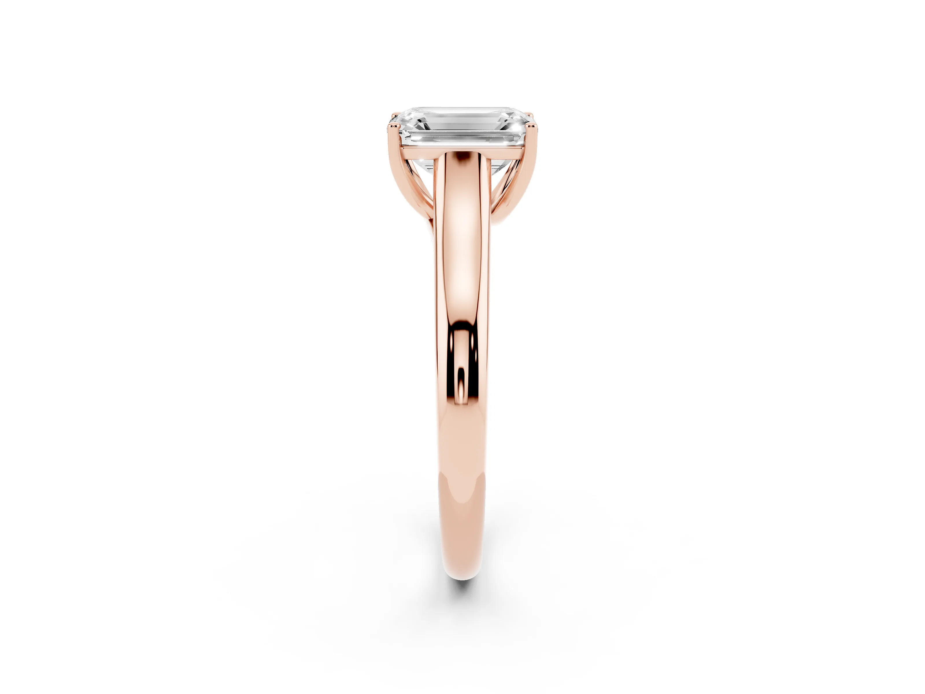 Emerald Cut Diamond Solitaire Engagement Ring Set in Rose gold with Subtly Tapered Band and Prong Setting