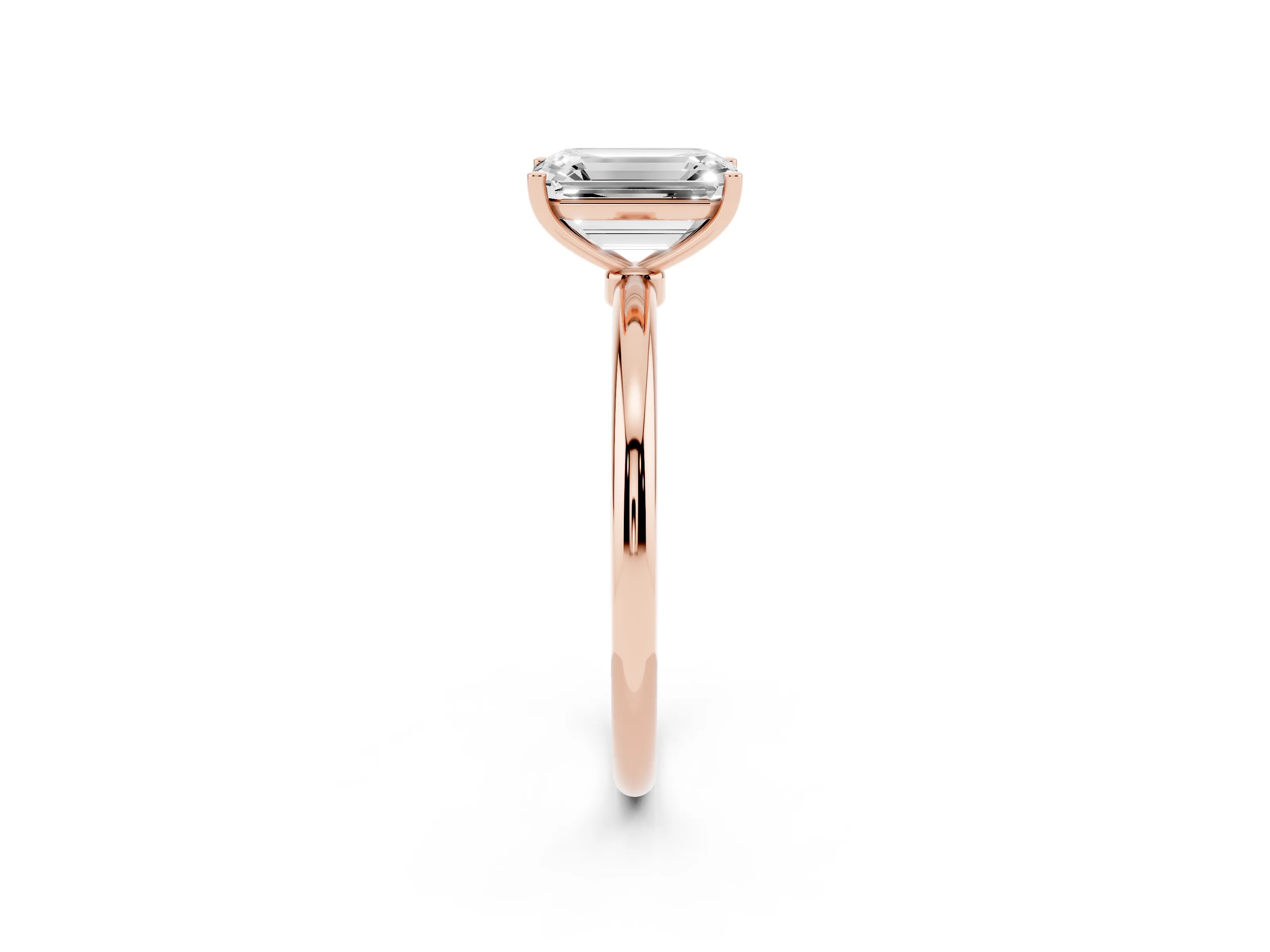 Emerald Cut Diamond Solitaire Engagement Ring Set in Rose gold with Thin Band and Prong Setting