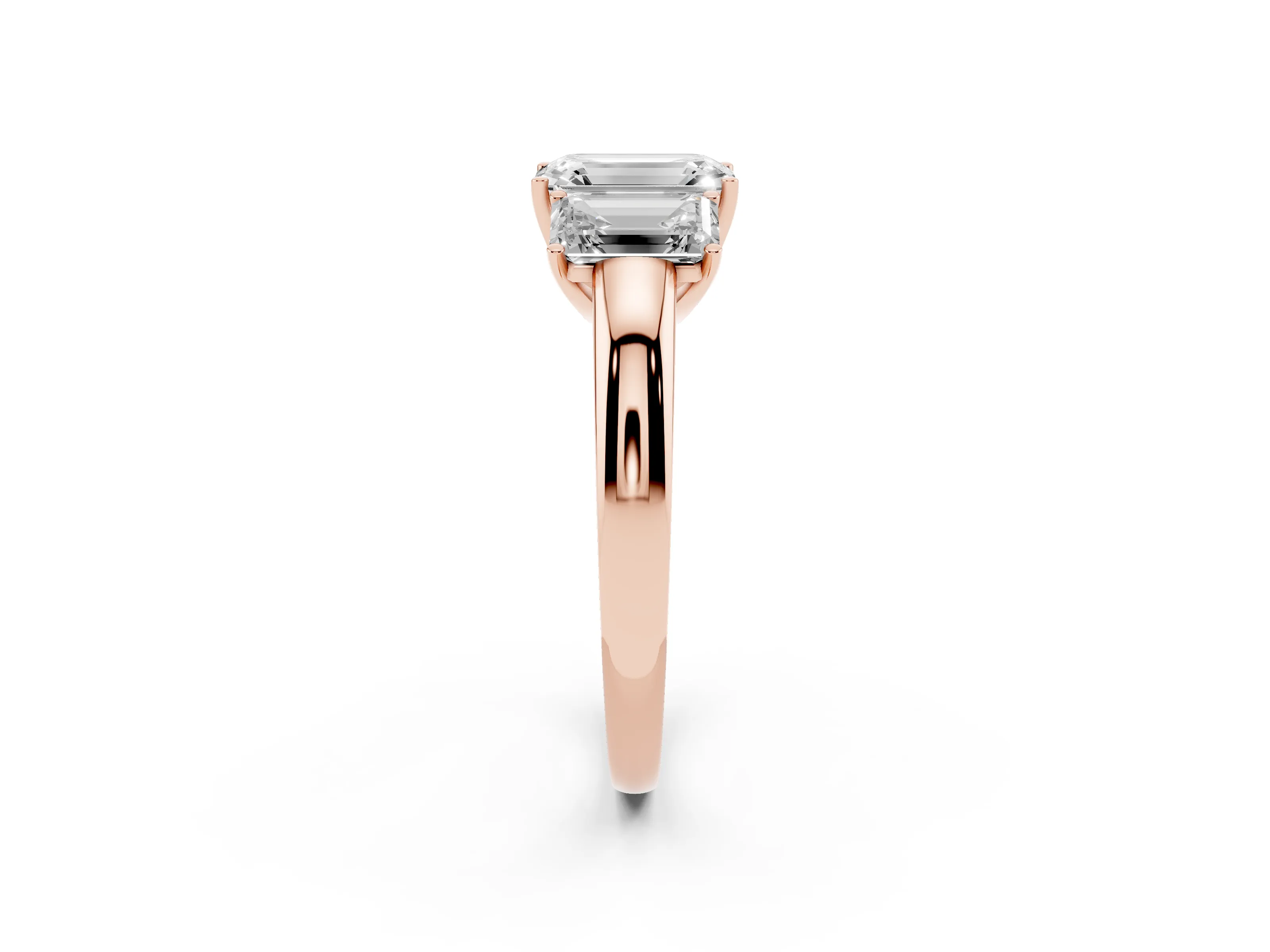 Emerald Cut Diamond Three-Stone Ring Set in Rose gold with Bold Center and Classic Band