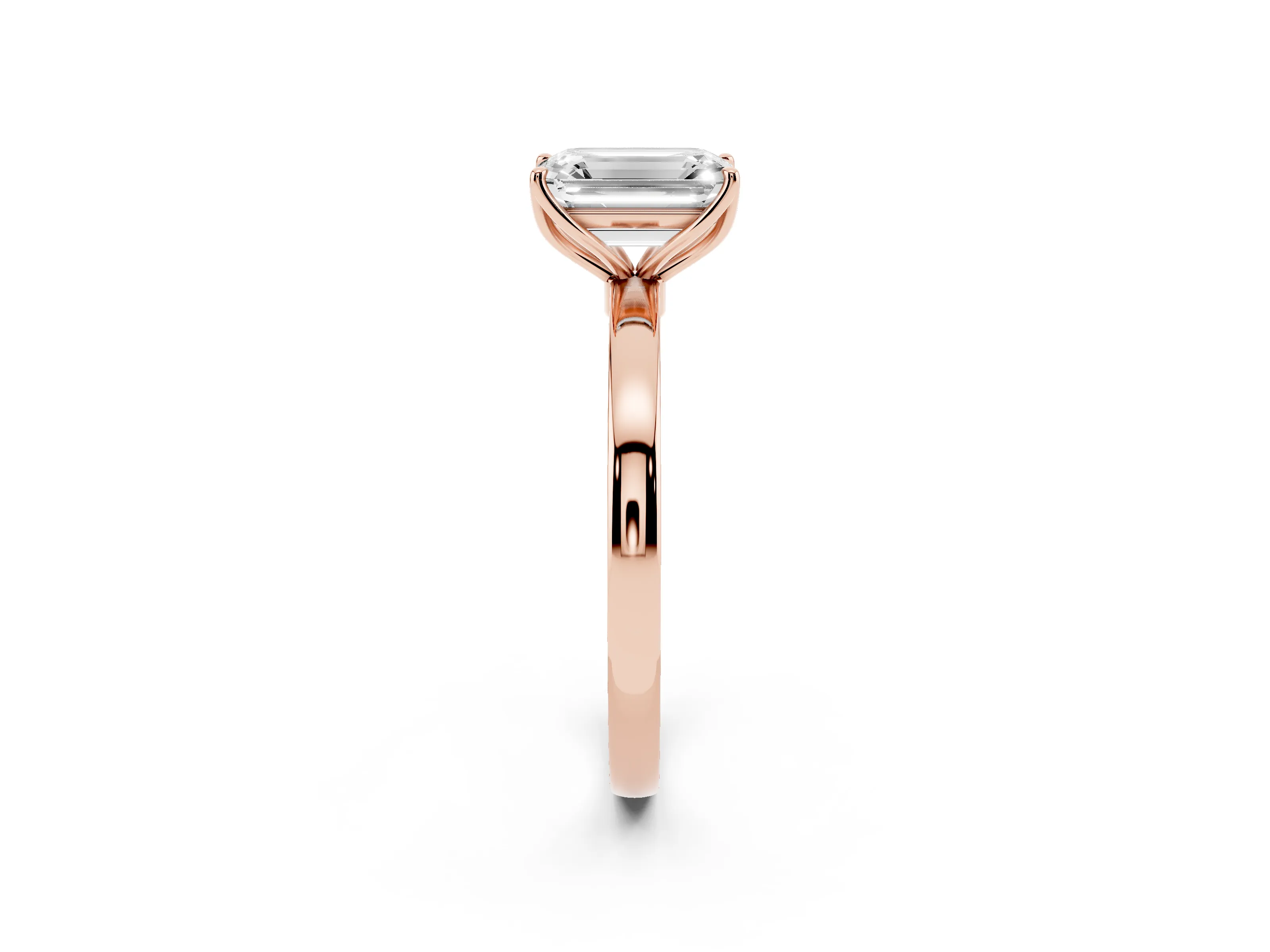 Emerald Cut Diamond Solitaire Ring Set in Rose gold with Prong Setting and Thin Polished Band