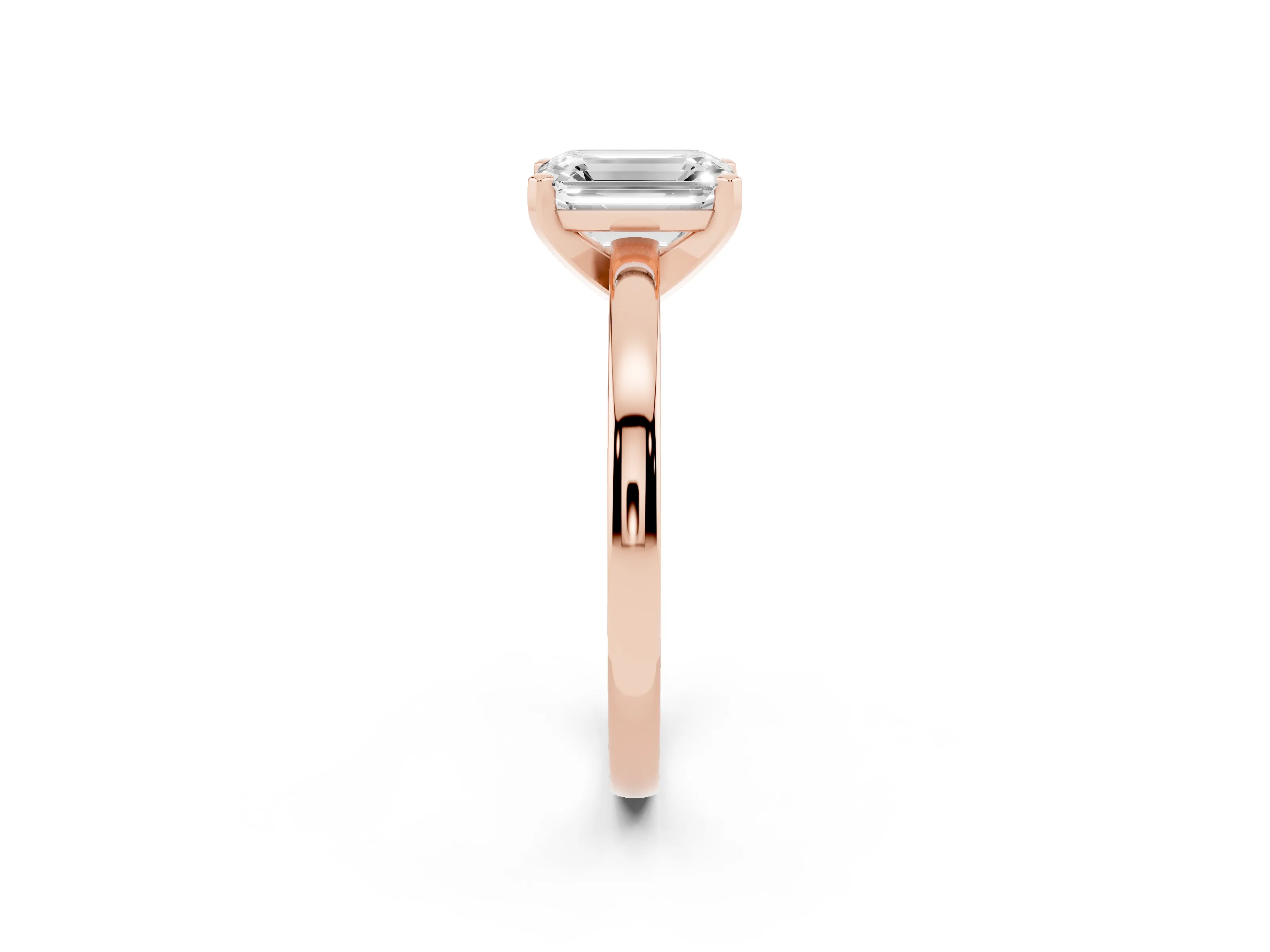 Emerald Cut Diamond Solitaire Engagement Ring Set in Rose gold with Prong Setting on a Classic Band
