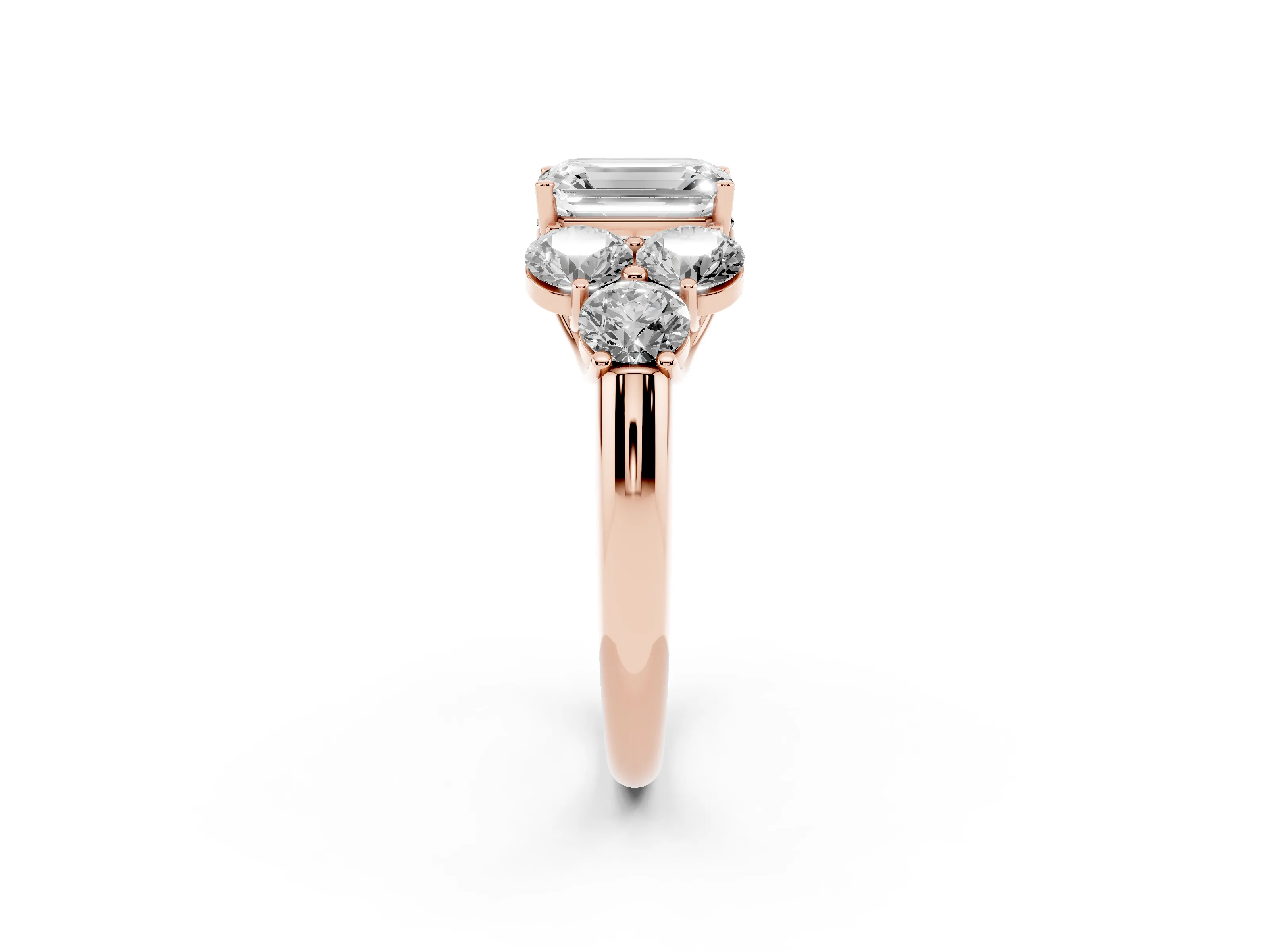Emerald Cut Diamond Cluster Ring Set in Rose gold with Round Accent Stones and Prong Setting on a Plain Band