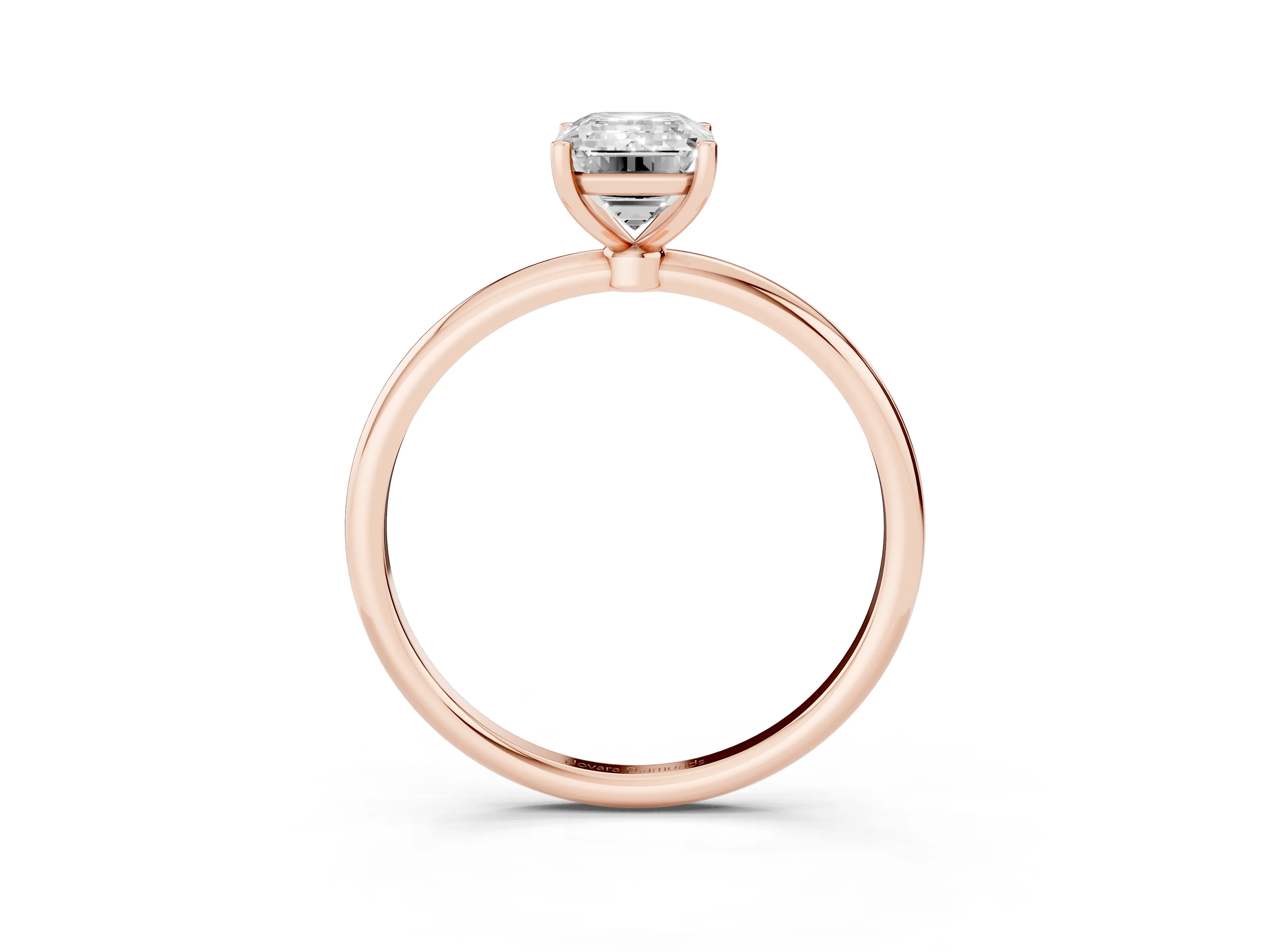 Emerald Cut Diamond Solitaire Engagement Ring Set in Rose gold with Thin Band and Prong Setting
