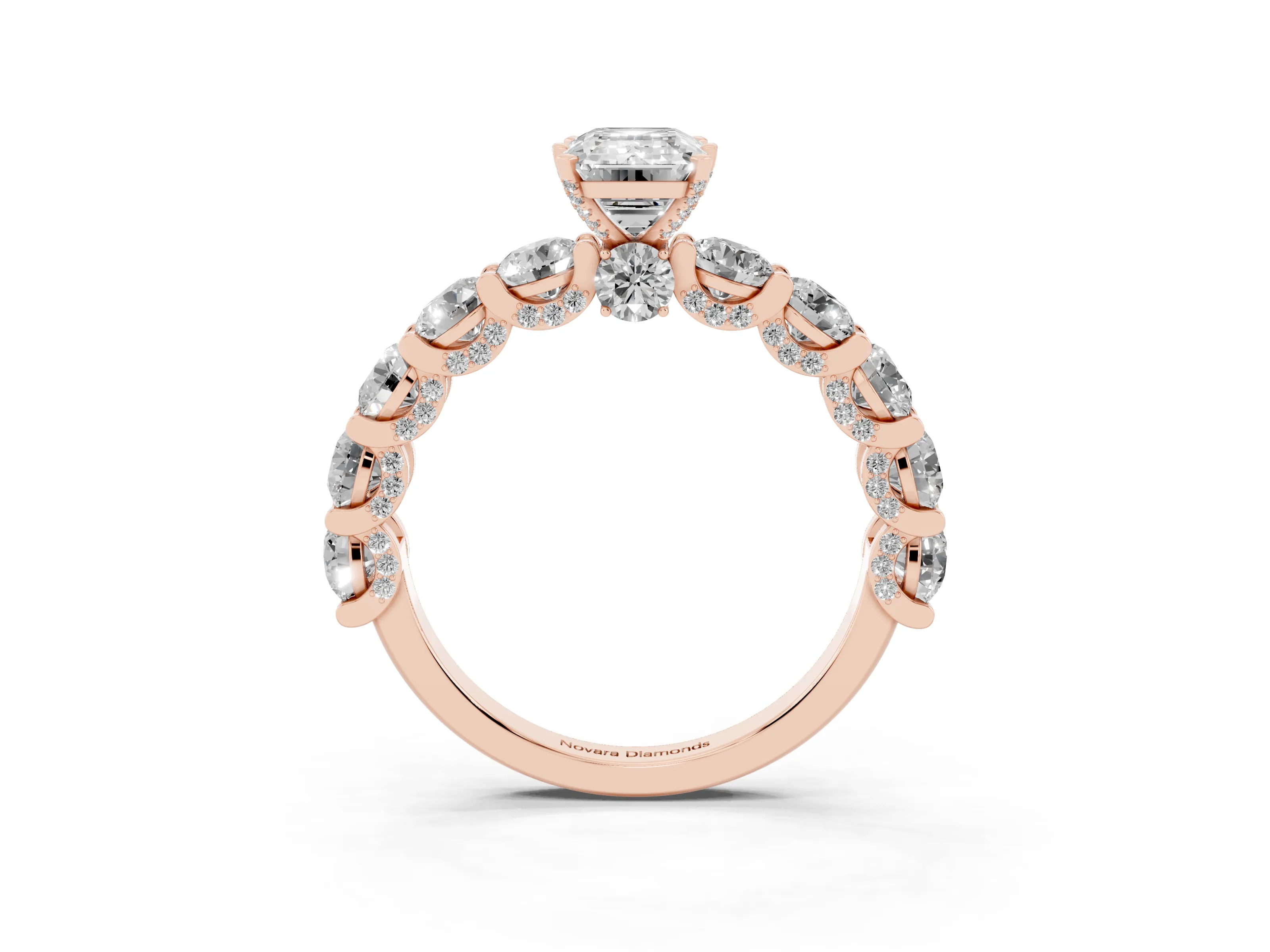 Emerald Cut Diamond Side Stone Ring Set in Rose gold with Alternating Round and Oval Side Stones