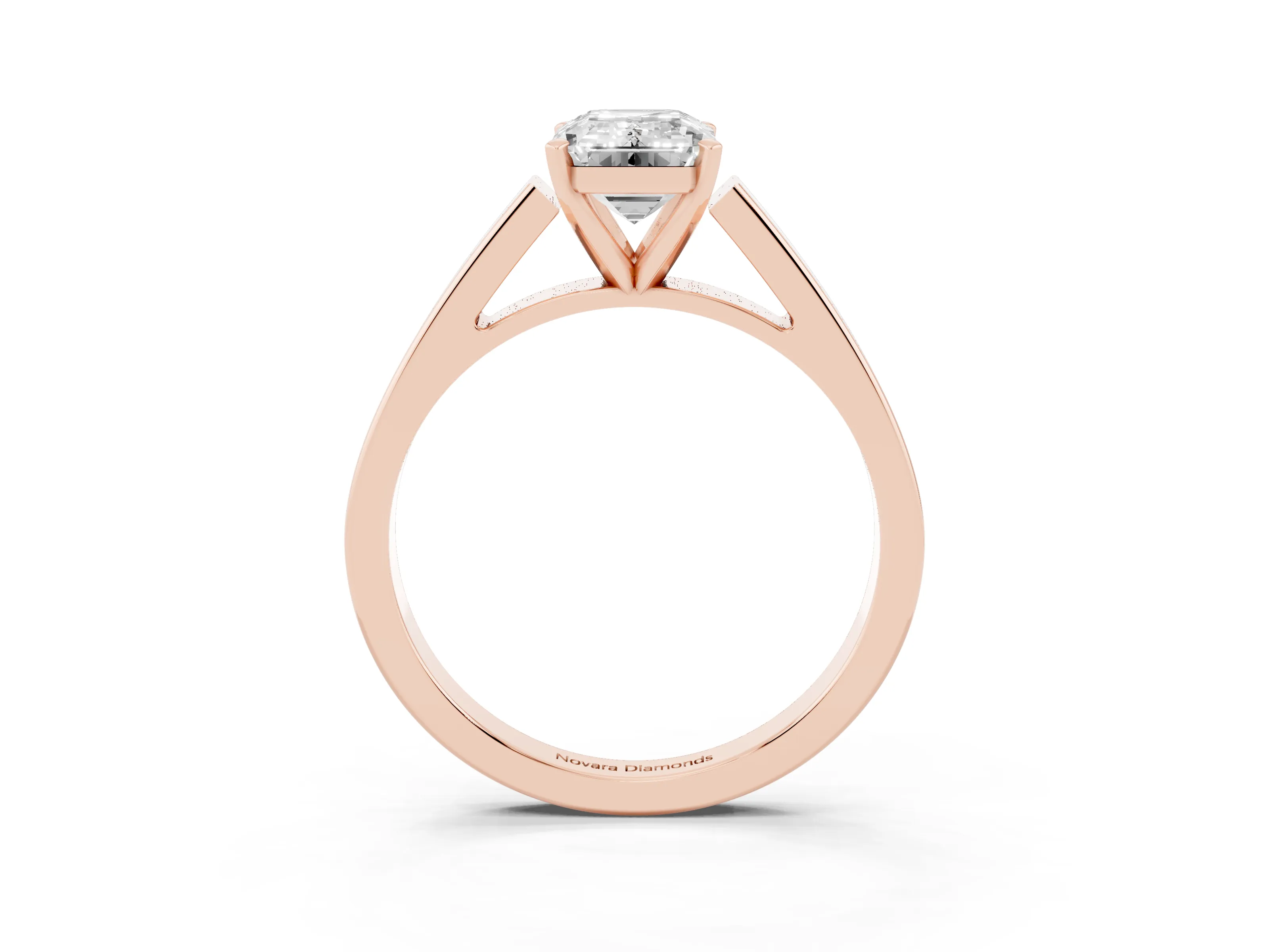 Emerald Cut Diamond Solitaire Engagement Ring Set in Rose gold with Prong Setting and Tapered Band