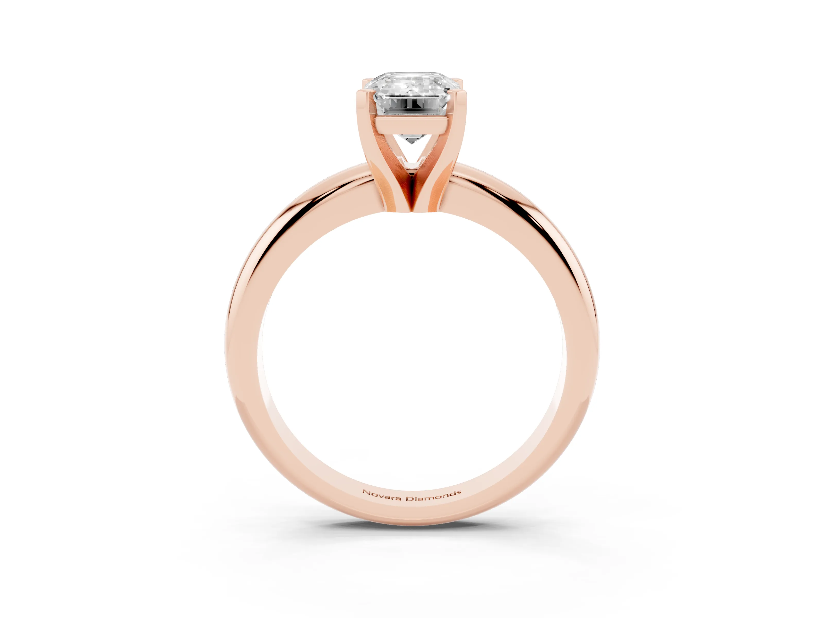 Emerald Cut Diamond Solitaire Engagement Ring Set in Rose gold with Round Band and Prong Setting