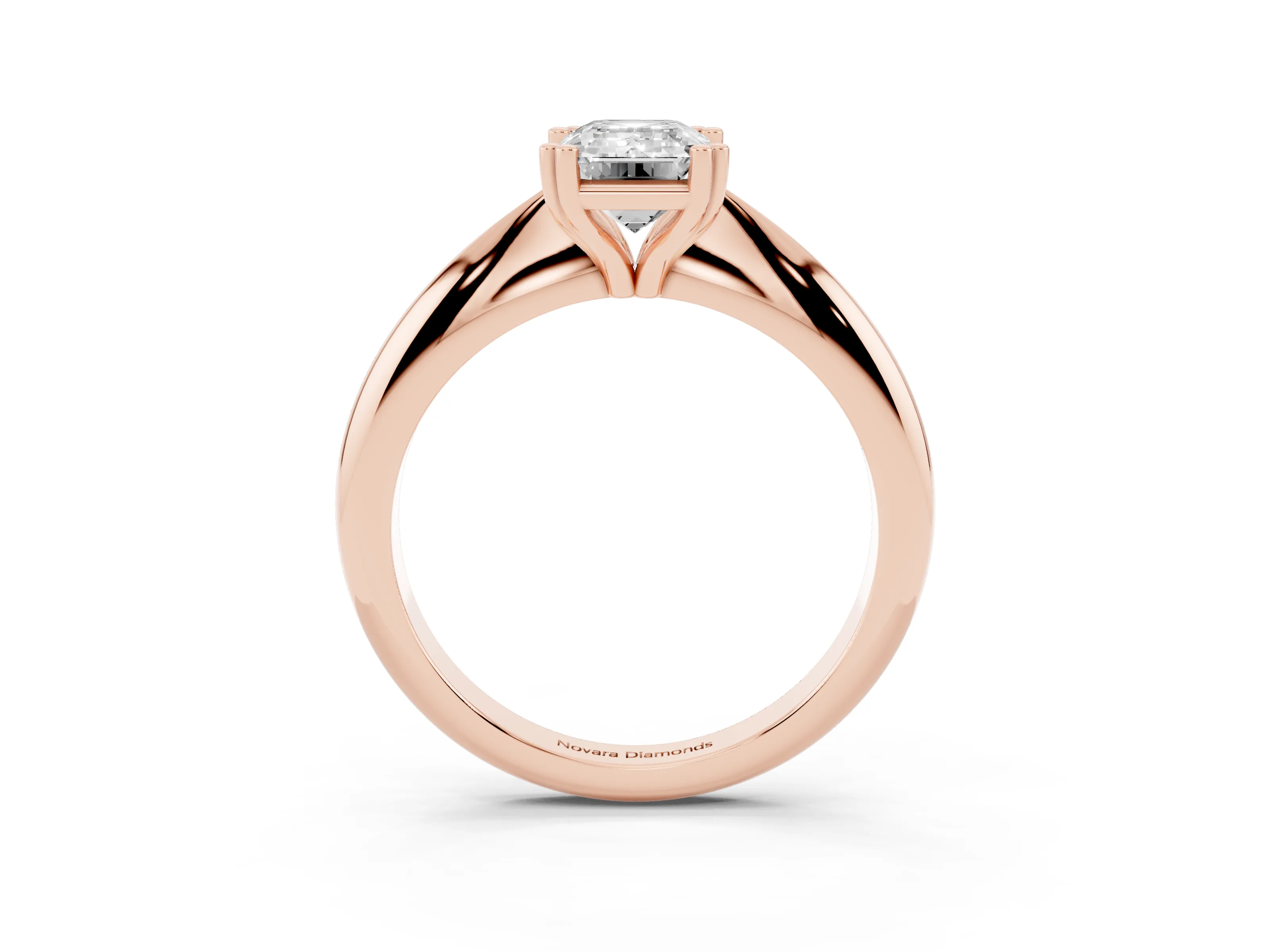 Emerald Cut Diamond Solitaire Engagement Ring Set in Rose gold with Tapered Band and Prong Setting
