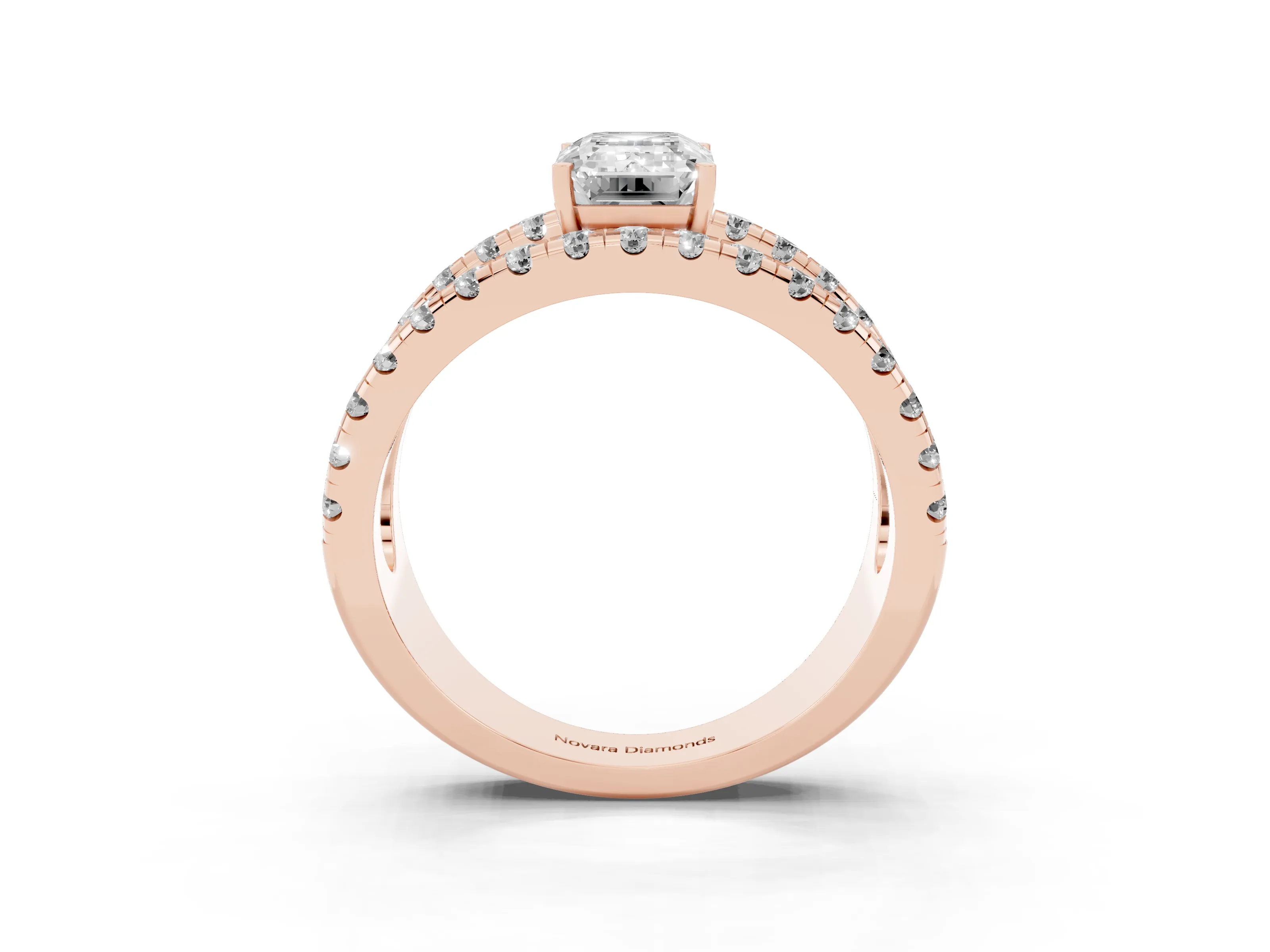Emerald Cut Diamond Split Shank Pavé Solitaire Ring Set in Rose gold with Open Shank Design