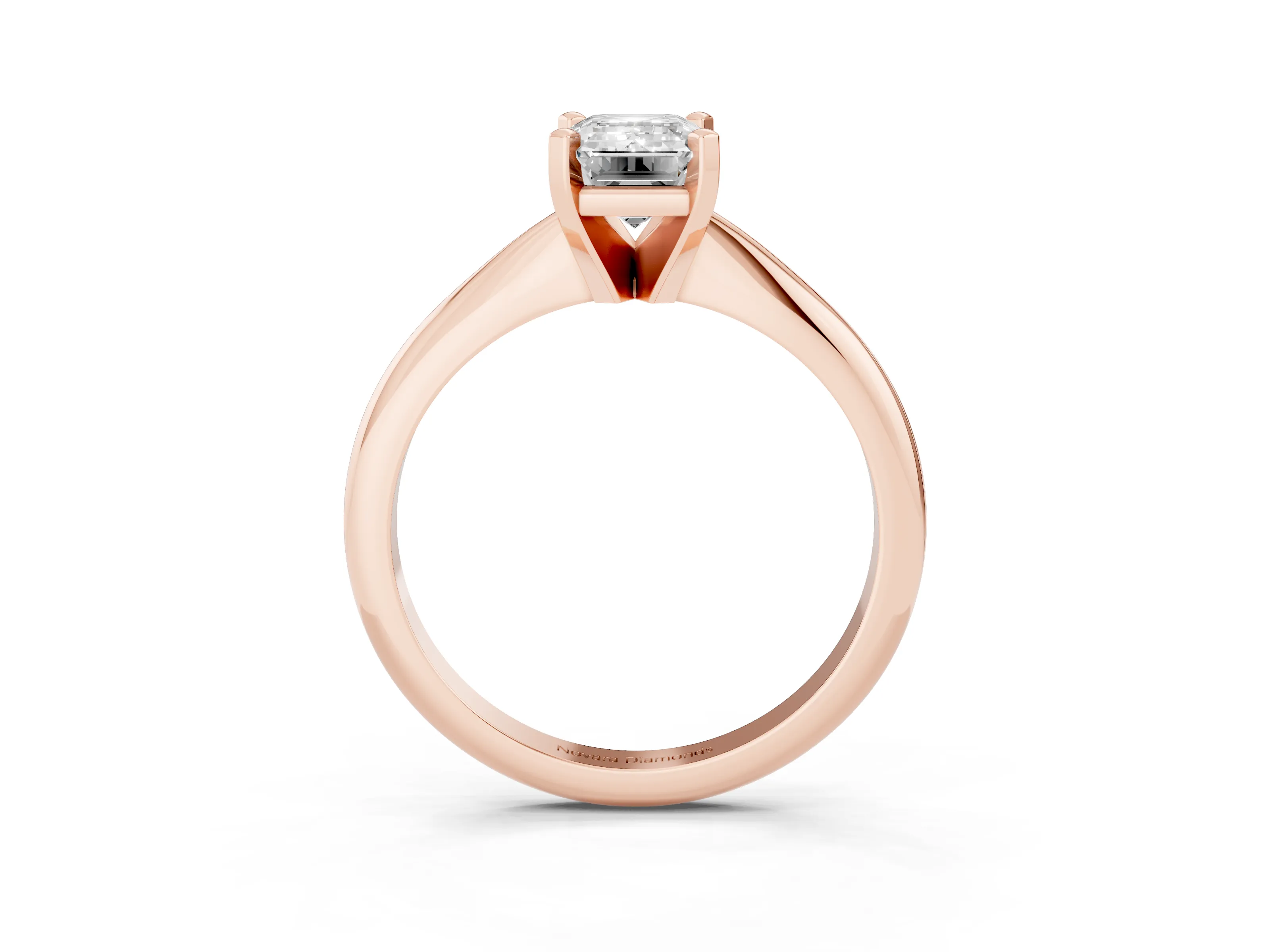 Emerald Cut Diamond Solitaire Ring Set in Rose gold with Prong Setting on a Plain Round Band