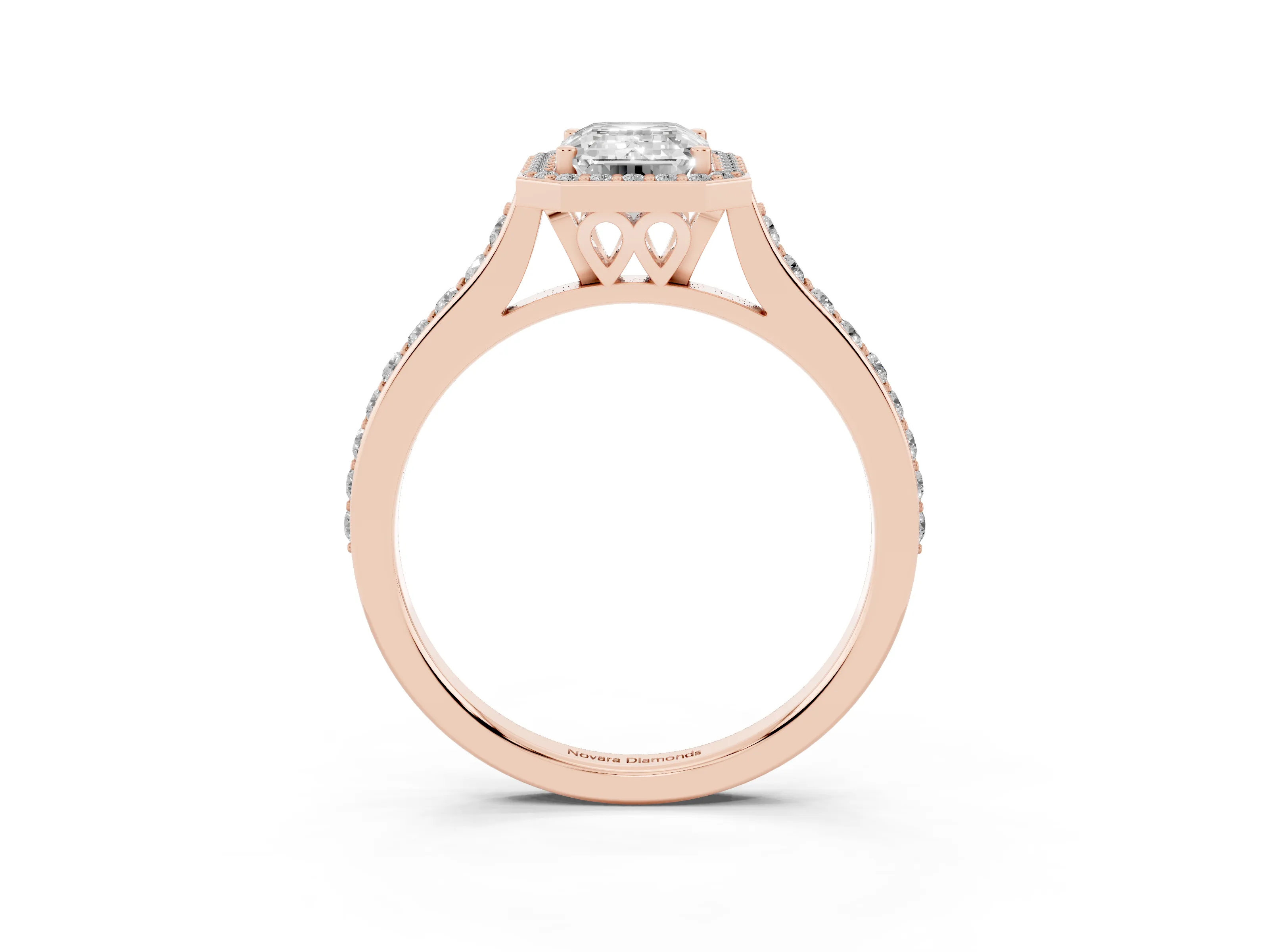 Emerald Cut Diamond Halo Engagement Ring Set in Rose gold with Round Pavé Shoulders and Heart Gallery