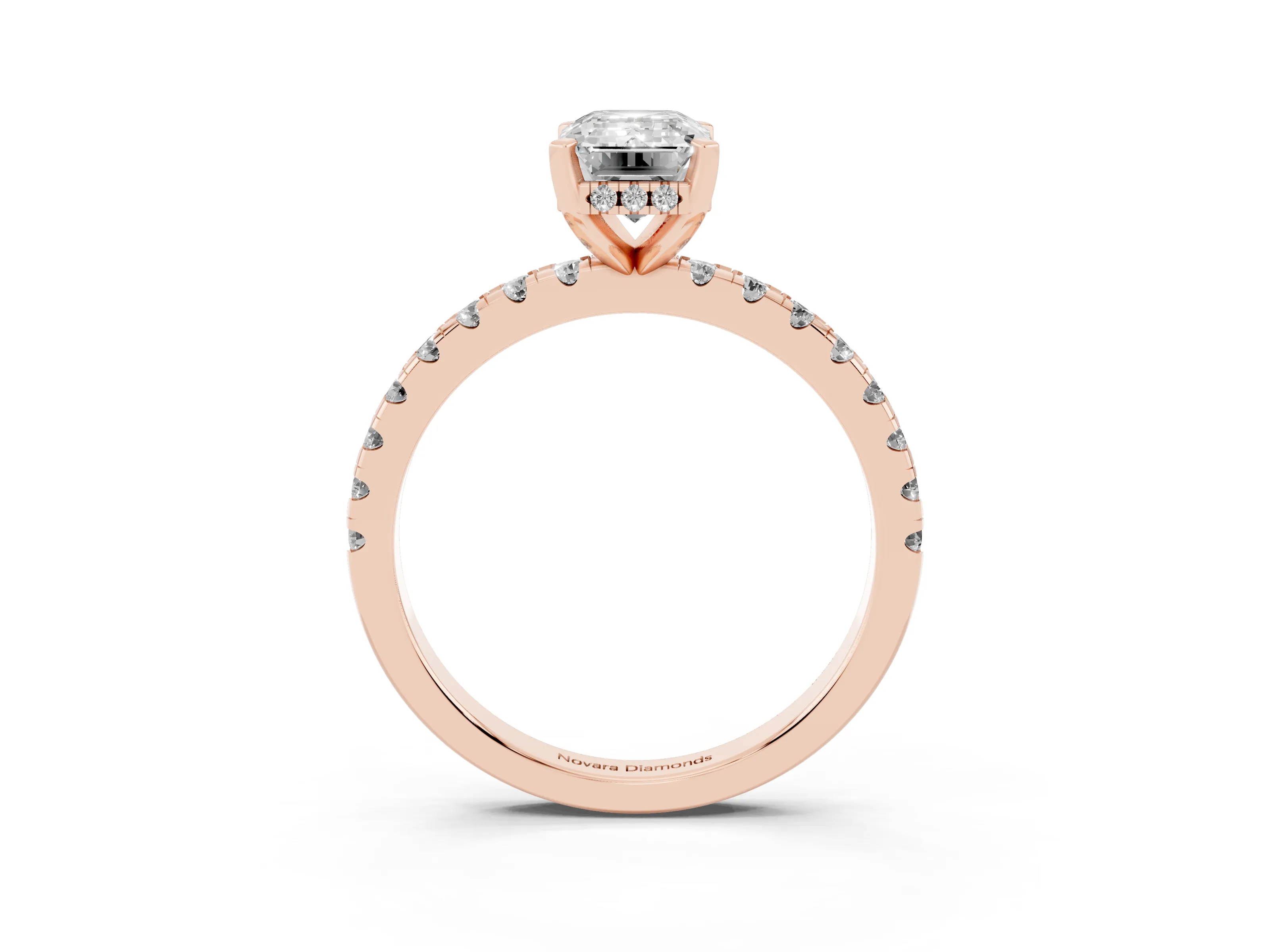Emerald Cut Diamond Pavé Solitaire Ring Set in Rose gold with Round Band Accents and Prong Setting