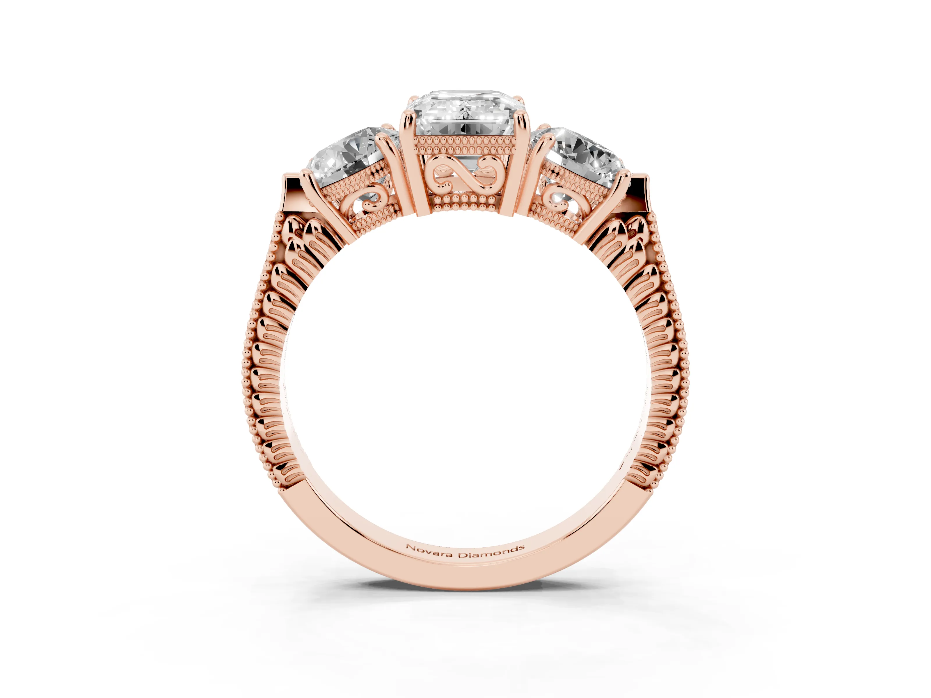 Emerald Cut Diamond Three-Stone Ring Set in Rose gold with Milgrain Band