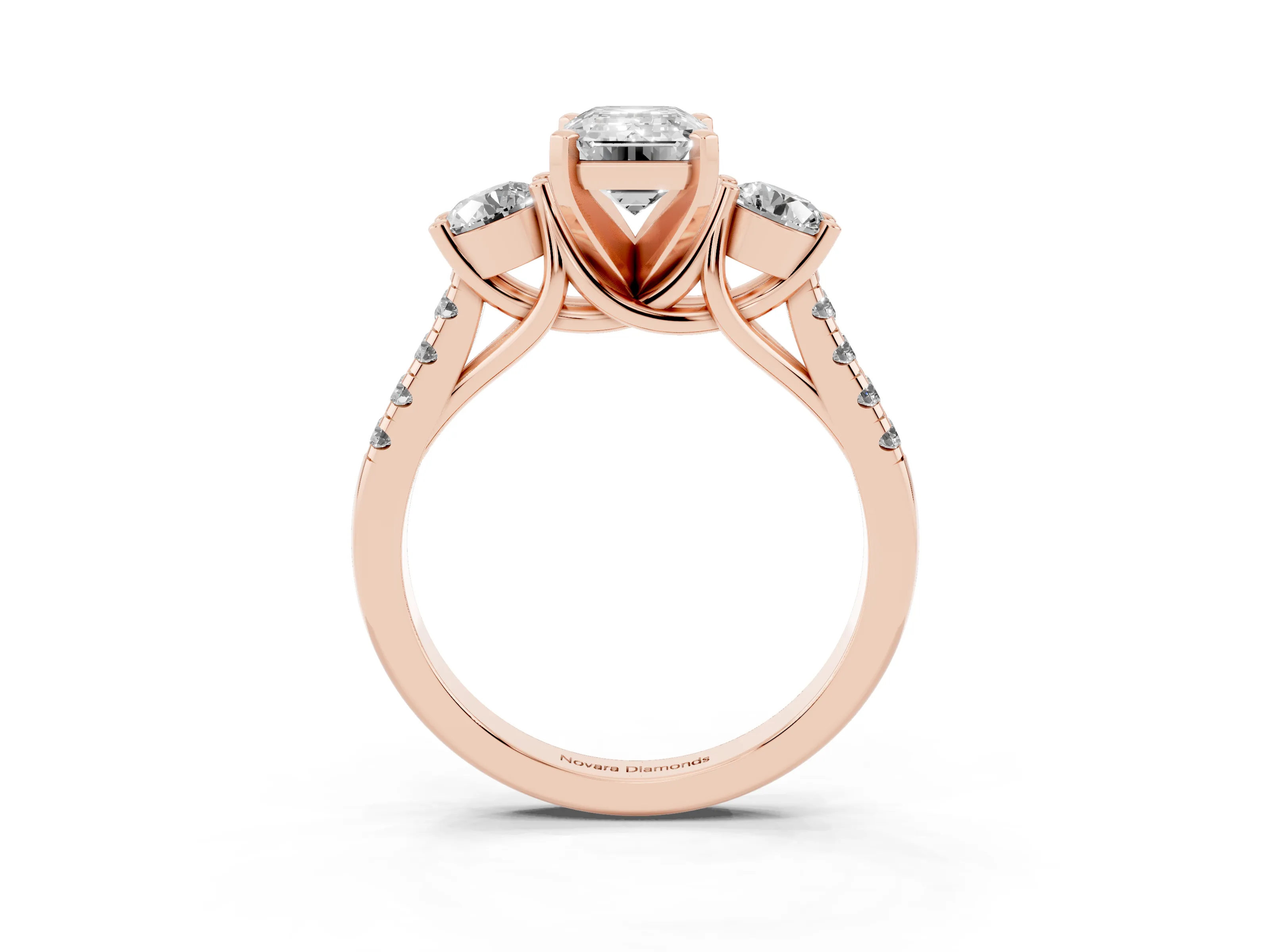 Three-Stone Emerald Cut Diamond Pavé Band Ring Set in Rose gold with Prong-Set Trio