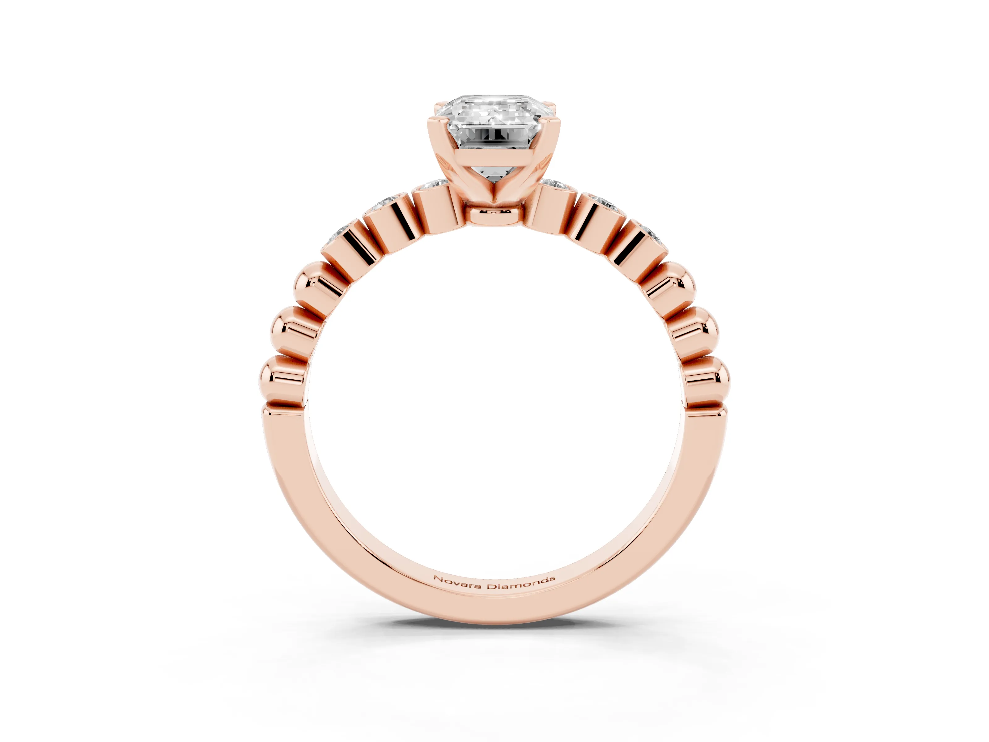 Emerald Cut Diamond Solitaire Engagement Ring Set in Rose gold with Bezel Accents on Beaded Band