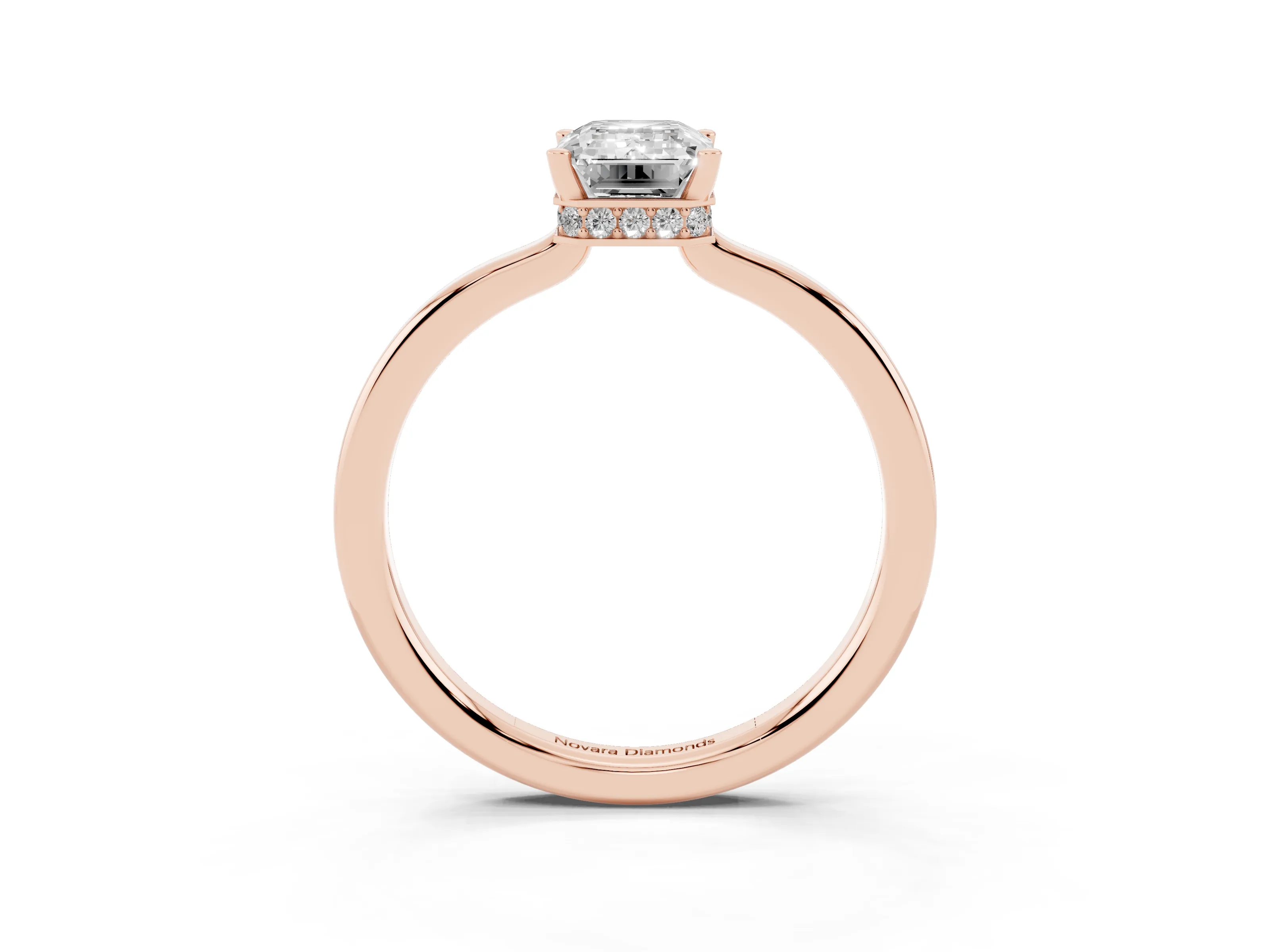 Emerald Cut Diamond Solitaire Engagement Ring Set in Rose gold with Prong Setting on a Plain Band