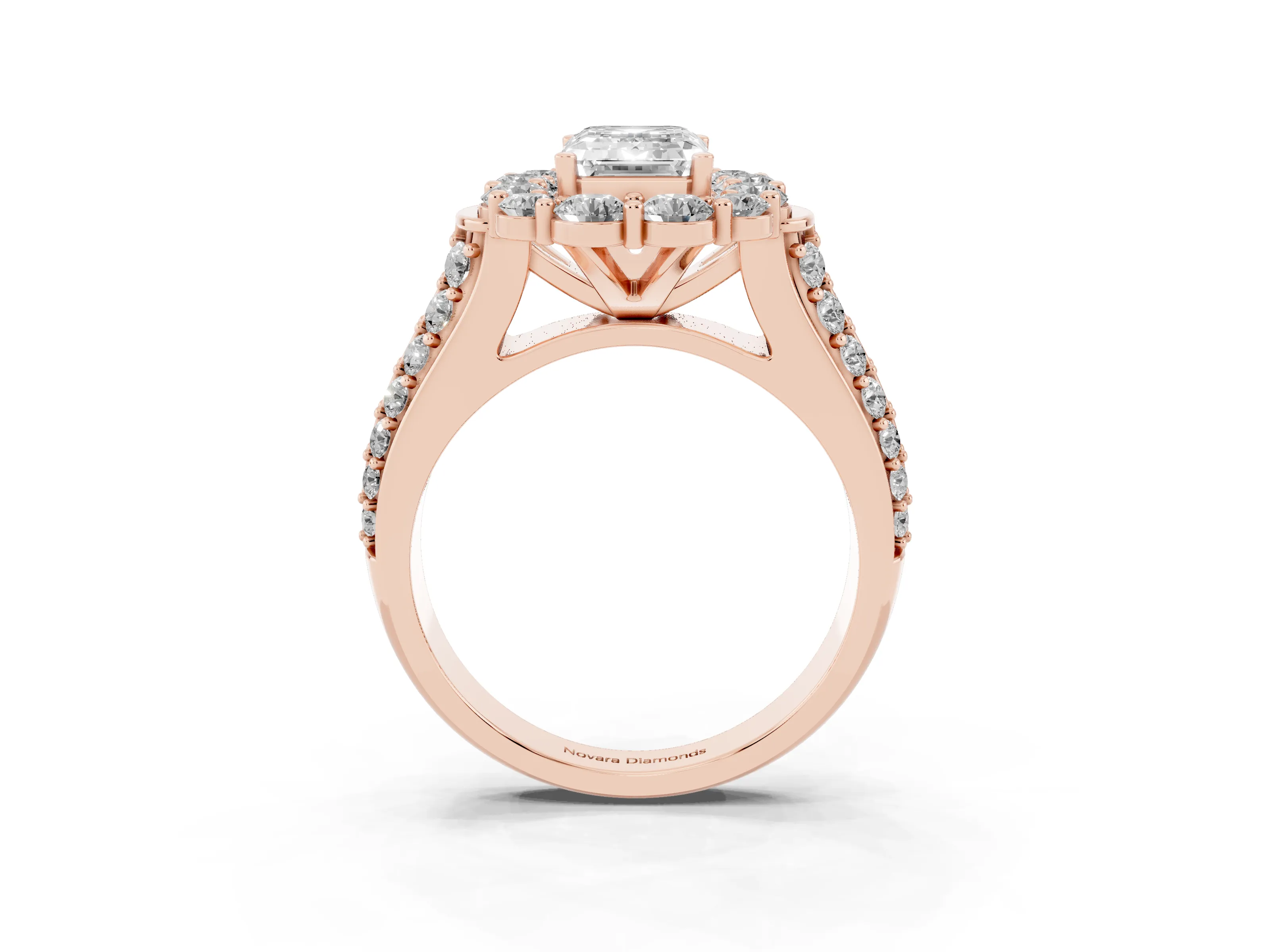 Emerald Cut Diamond Halo Engagement Ring Set in Rose gold with Split Shank and Prong Setting