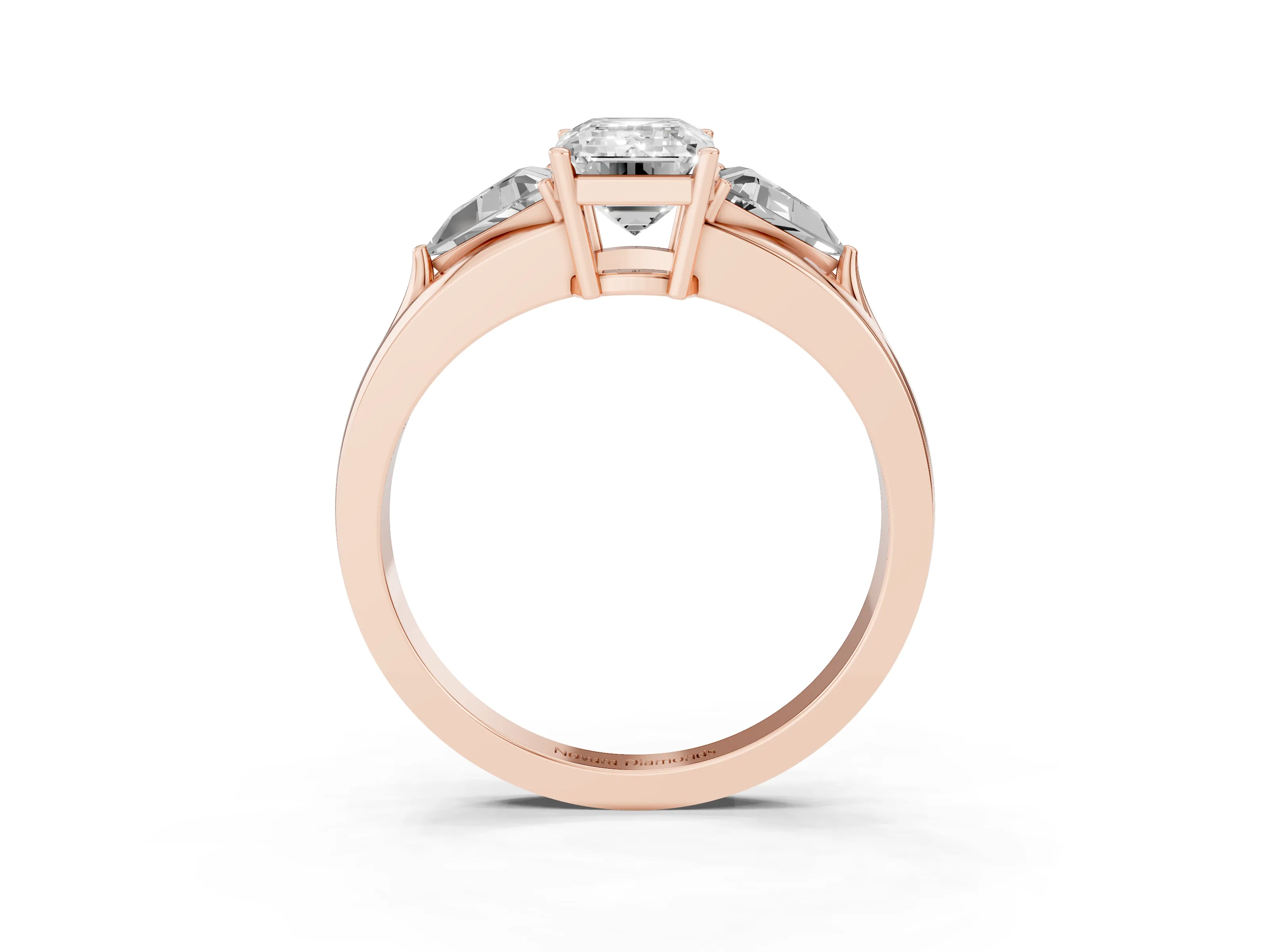 Emerald Cut Diamond Three-Stone Ring Set in Rose gold with Trillion Side Stones and Split Shank