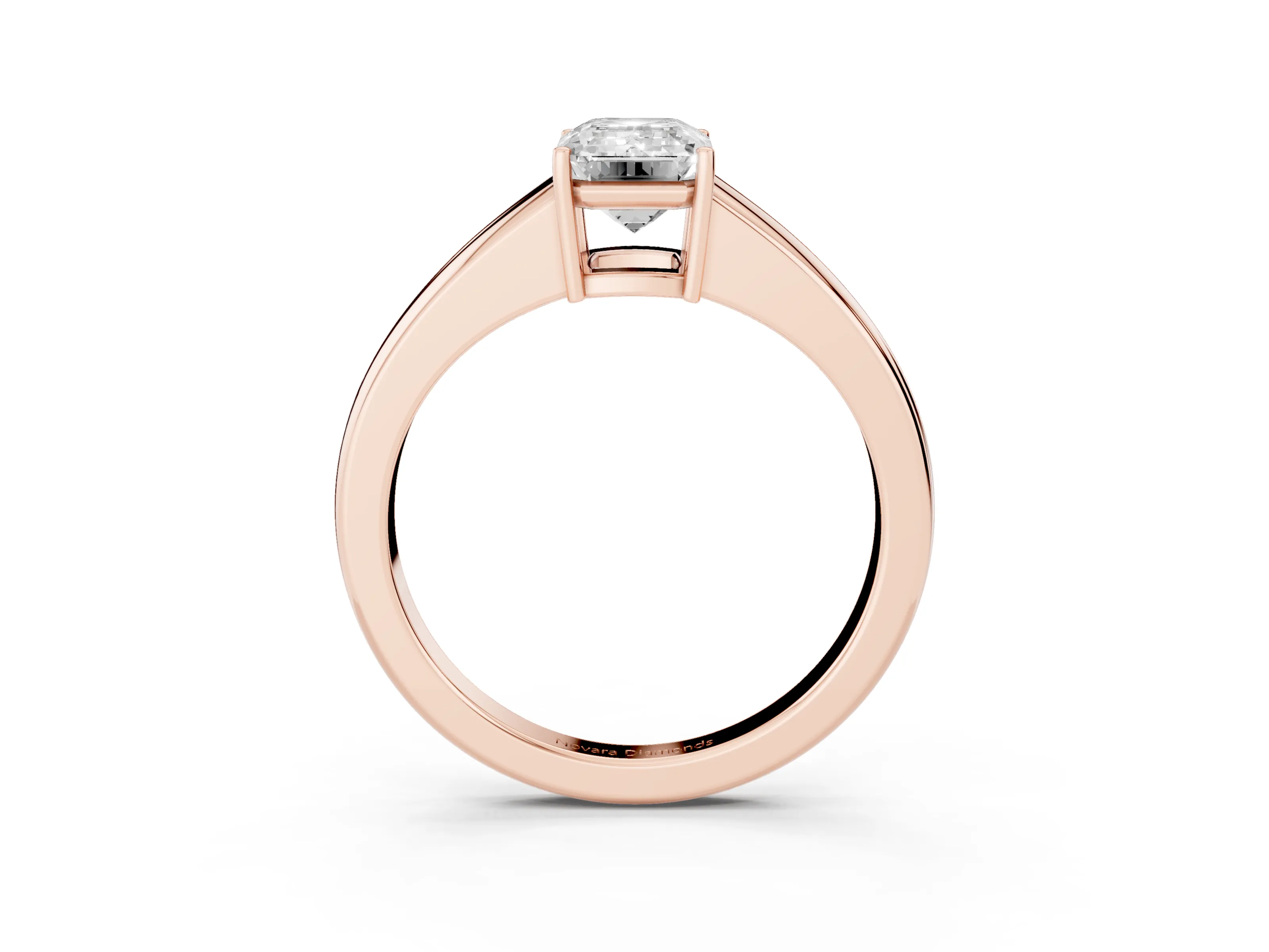 Emerald Cut Diamond Solitaire Ring Set in Rose gold with Tapered Band and Prong Setting