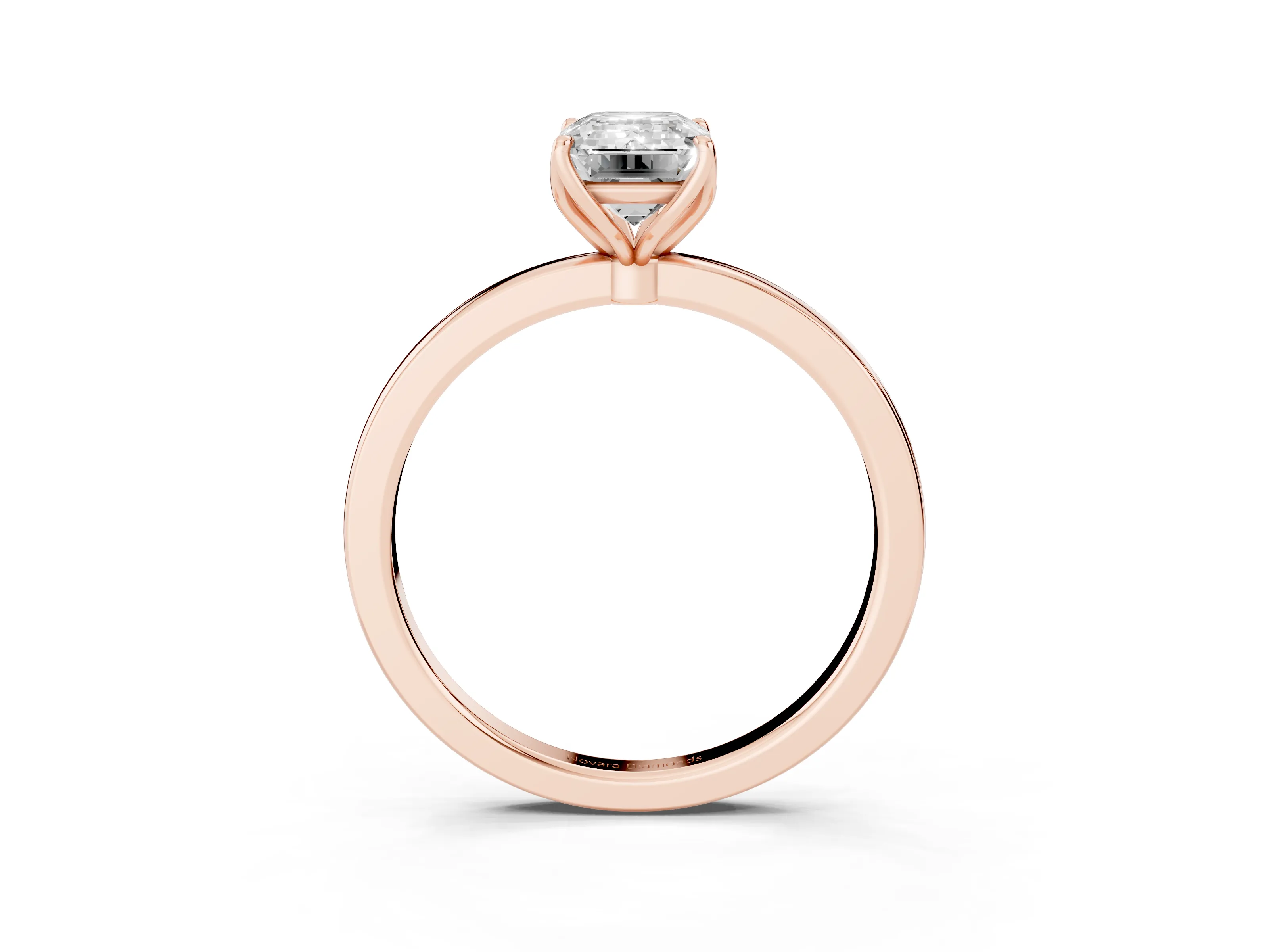 Emerald Cut Diamond Solitaire Ring Set in Rose gold with Prong Setting and Thin Polished Band