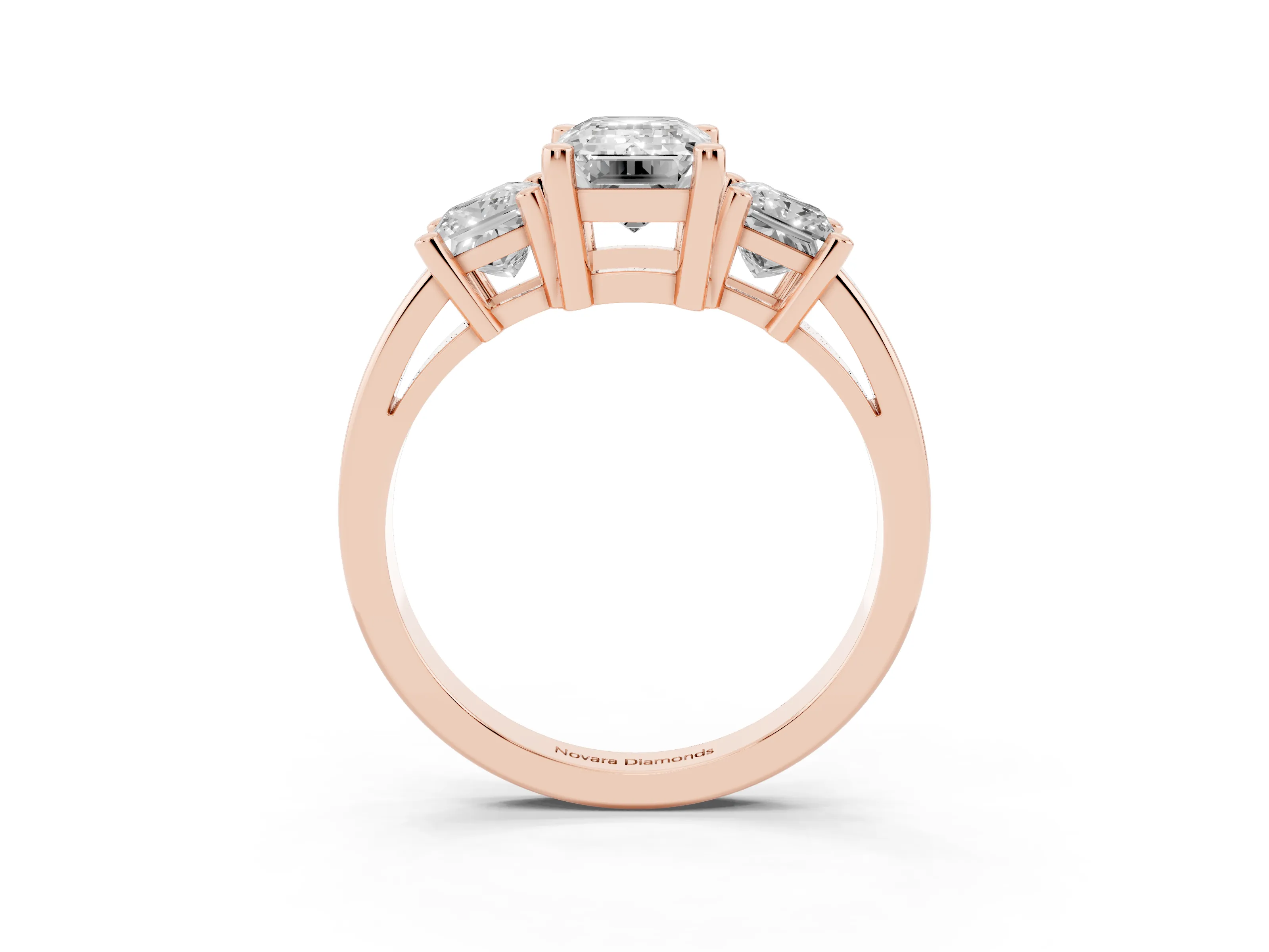 Three-Stone Emerald Cut Diamond Solitaire Ring Set in Rose gold with Prong Setting