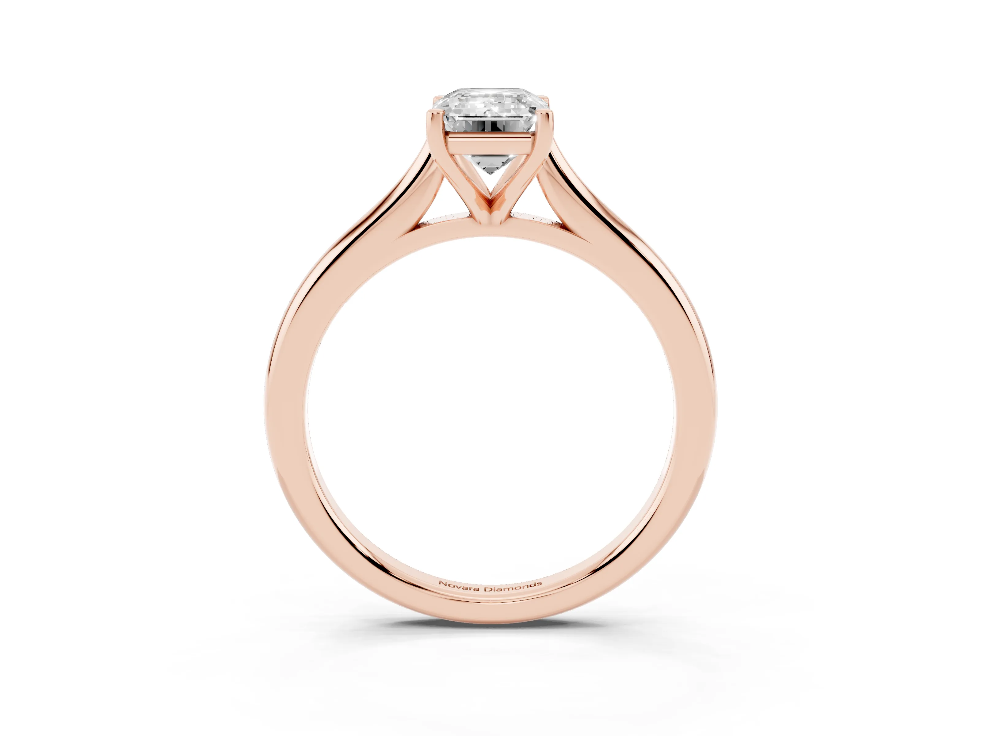Emerald Cut Diamond Solitaire Ring Set in Rose gold with Cathedral Band and Prong Setting