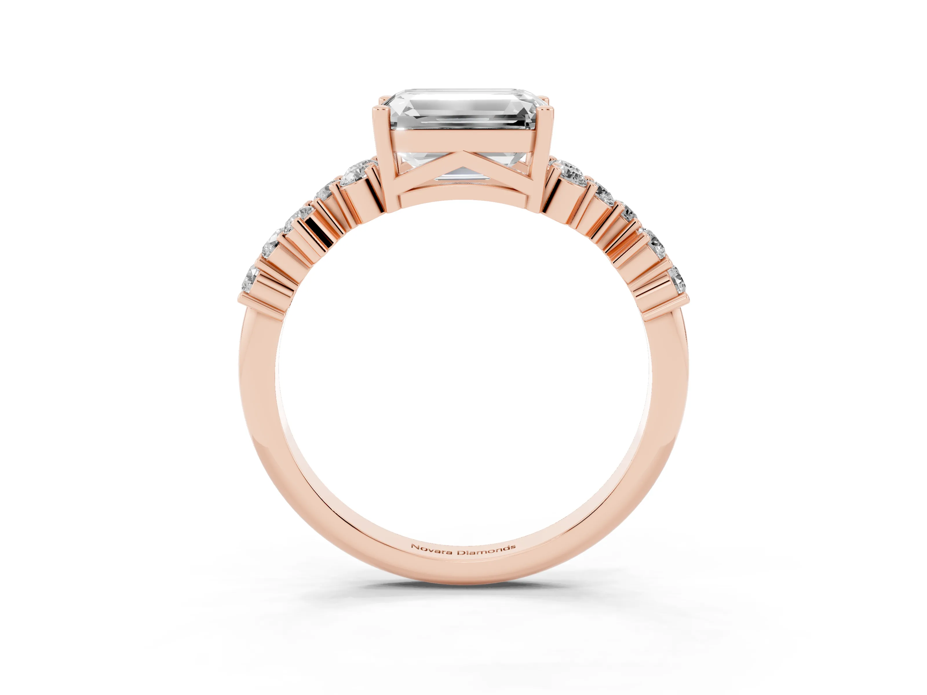 Emerald Cut Diamond Ring Set in Rose gold with Scattered Round Accents