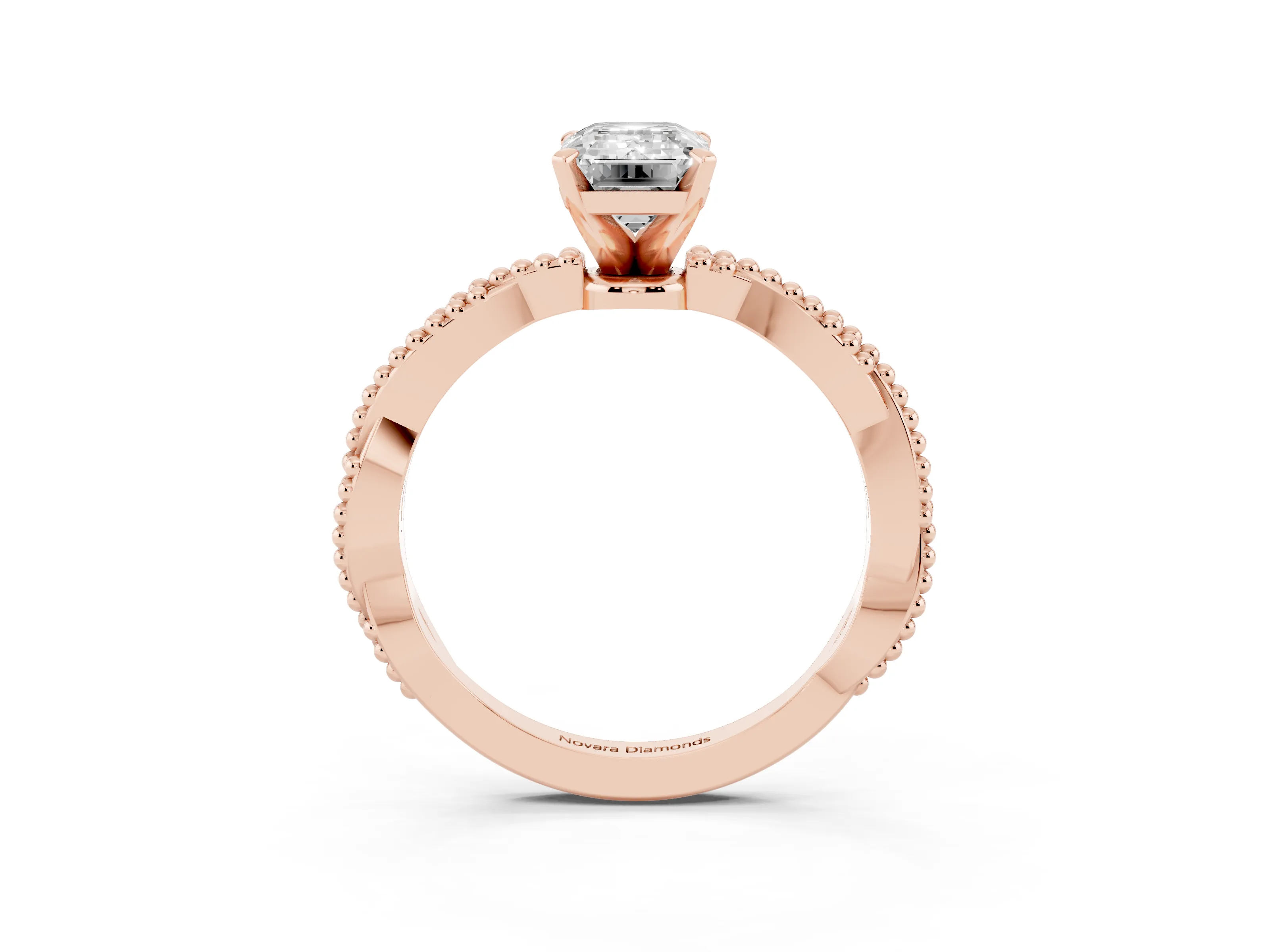 Emerald Cut Diamond Solitaire Ring Set in Rose gold with Twisted Band and Bead Prong Setting