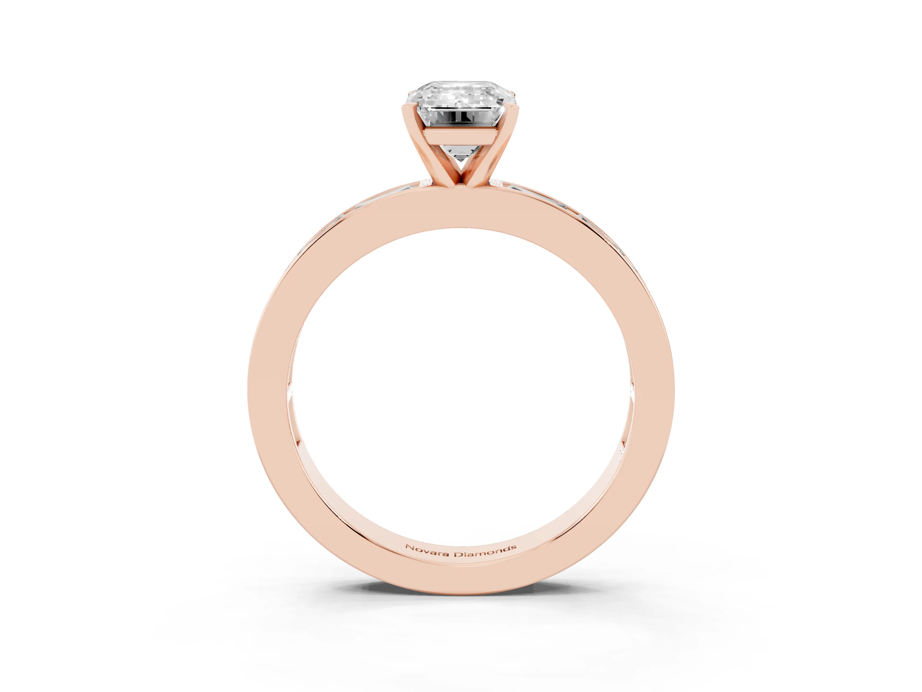 Emerald Cut Diamond Solitaire Ring Set in Rose gold with Channel-Set Baguette Band and Prong Setting