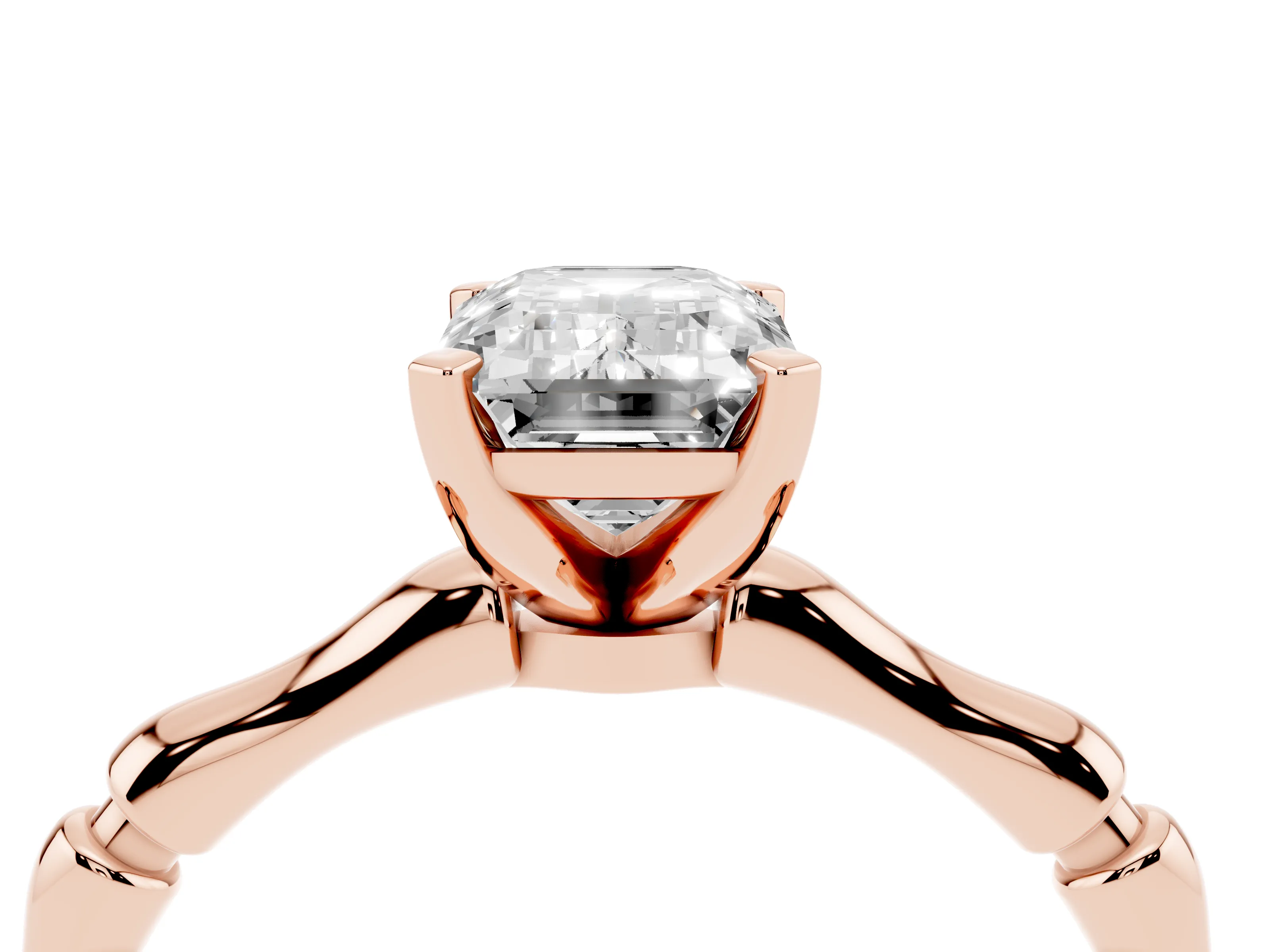 Emerald Cut Diamond Solitaire Ring Set in Rose gold with Bamboo Band and Prong Setting