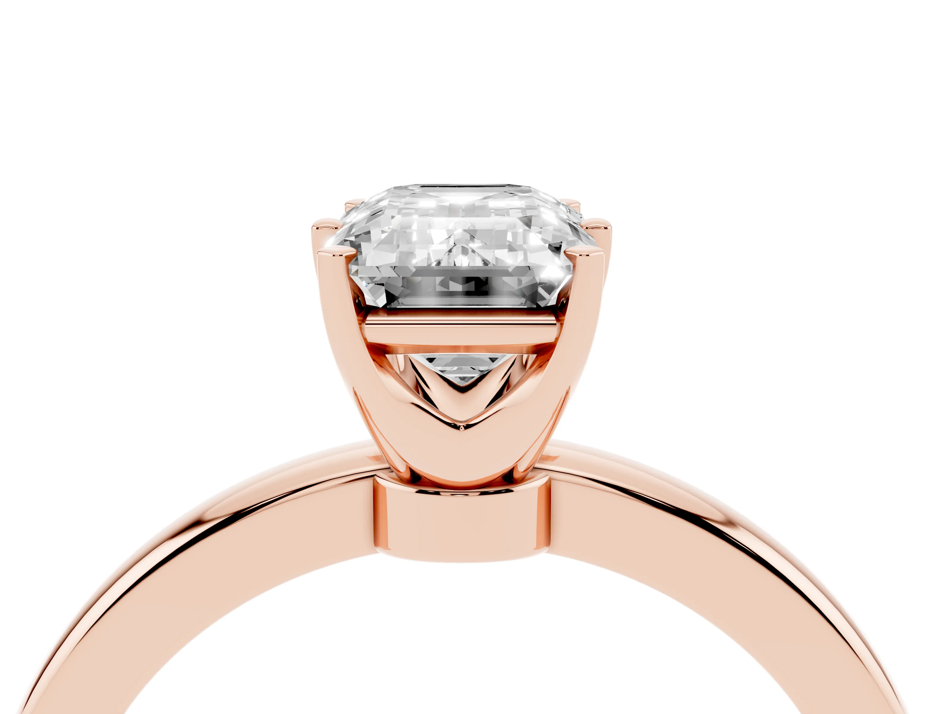 Emerald Cut Diamond Solitaire Ring Set in Rose gold with Raised Prong Setting on a Classic Band