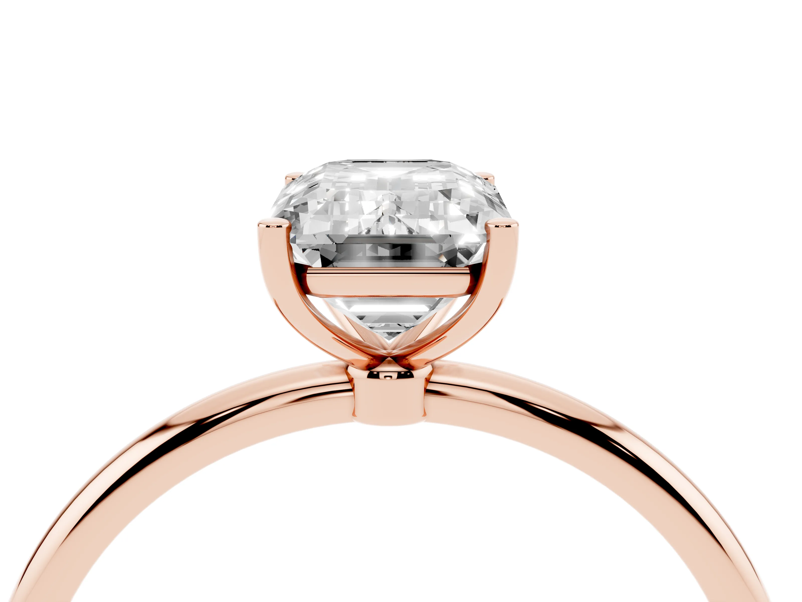 Emerald Cut Diamond Solitaire Engagement Ring Set in Rose gold with Thin Band and Prong Setting