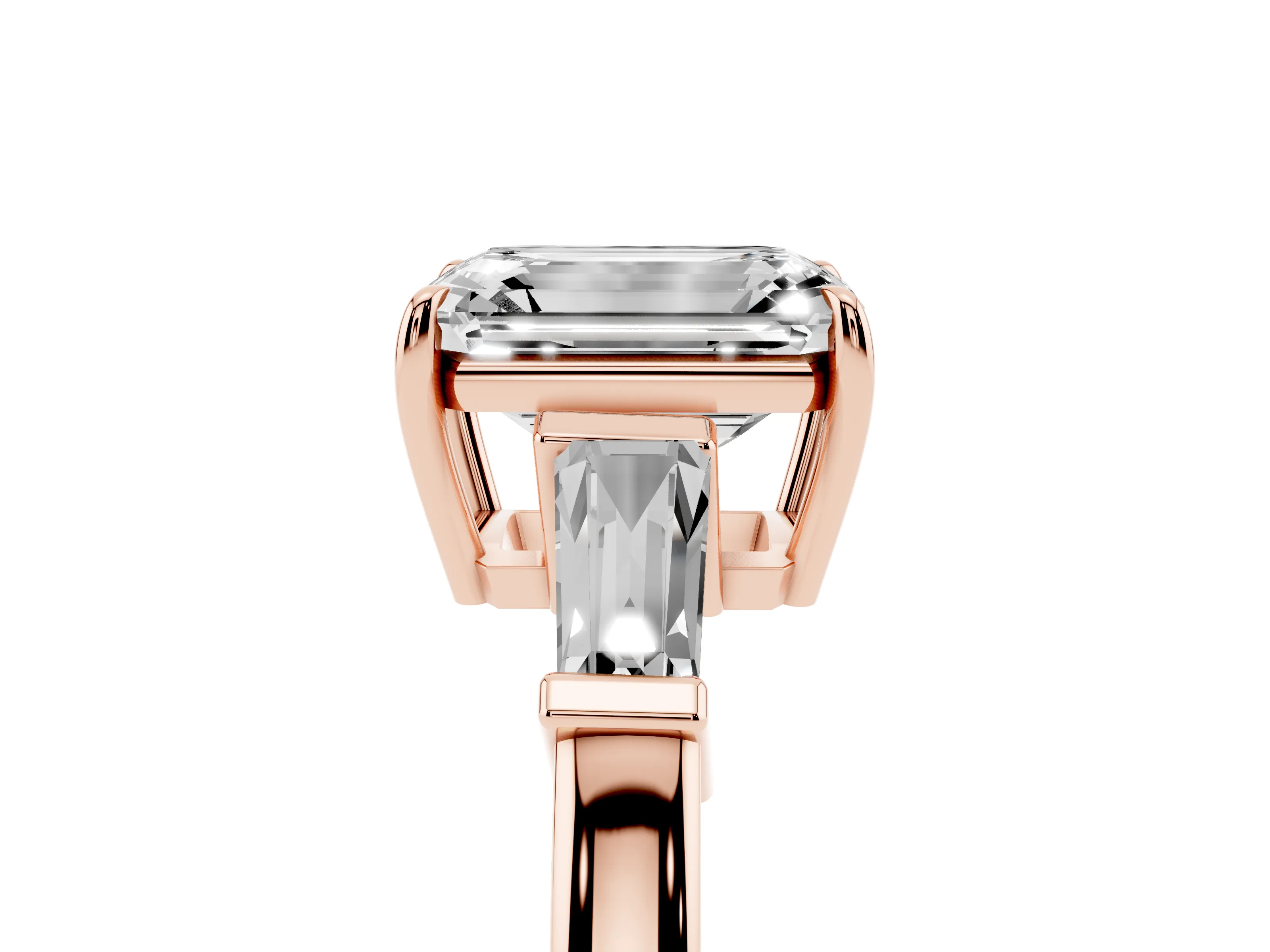 Emerald Cut Diamond Three-Stone Ring Set in Rose gold with Tapered Baguette Side Stones and Prong Setting