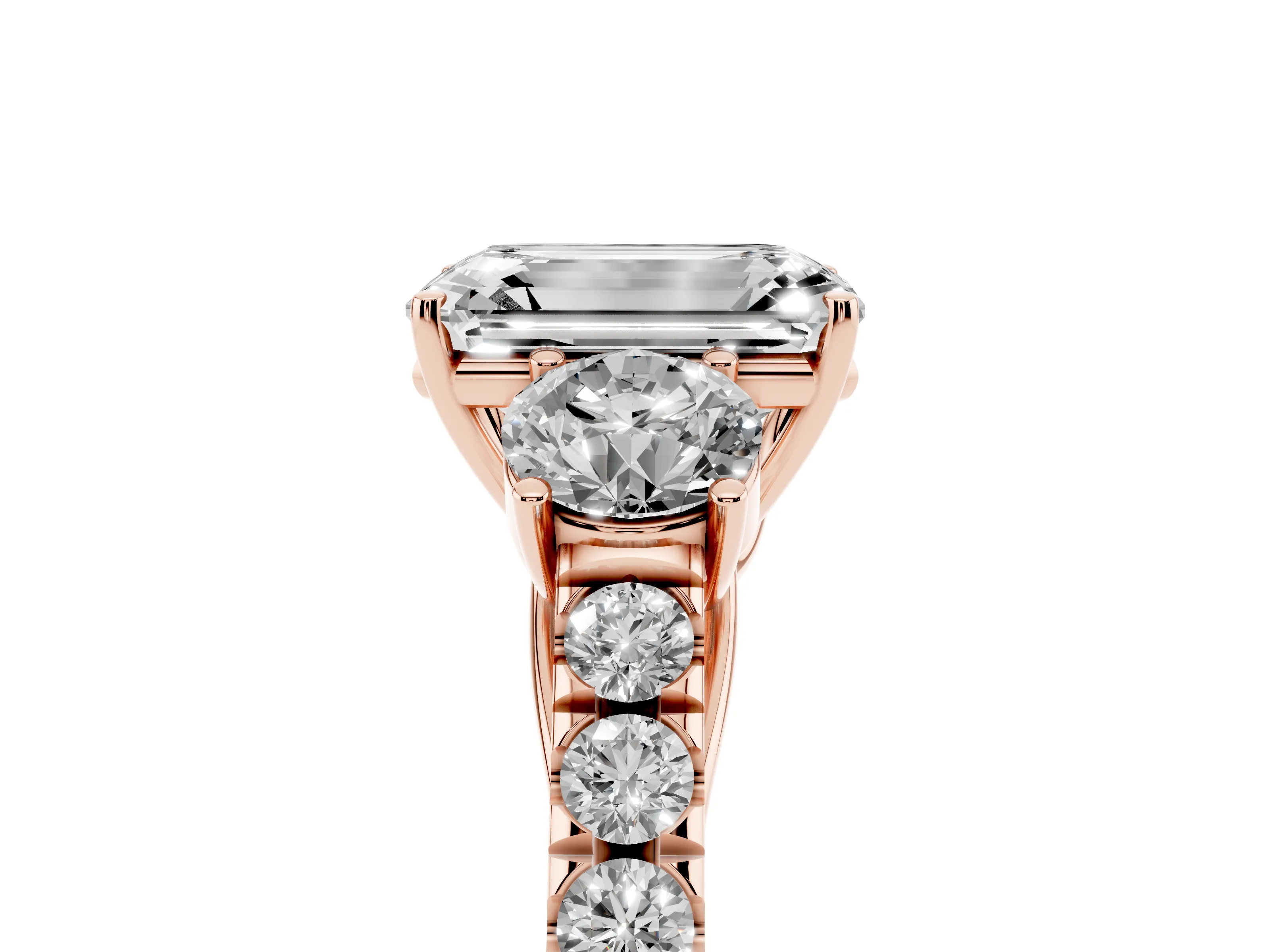Emerald Cut Diamond Three-Stone Ring Set in Rose gold with Round Side Stones and Delicate Pavé Band