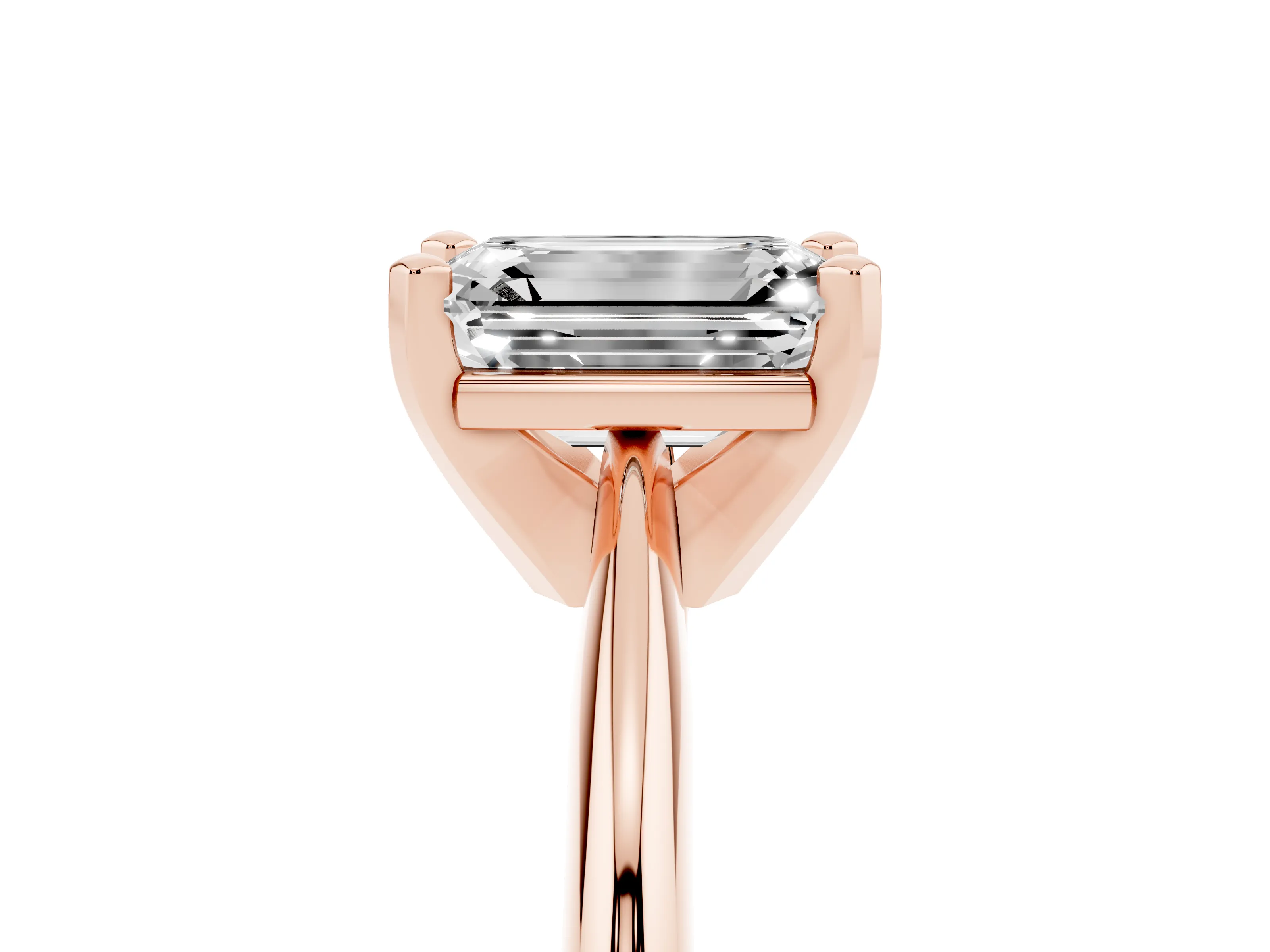Emerald Cut Diamond Solitaire Ring Set in Rose gold with Prong Setting on a Plain Round Band