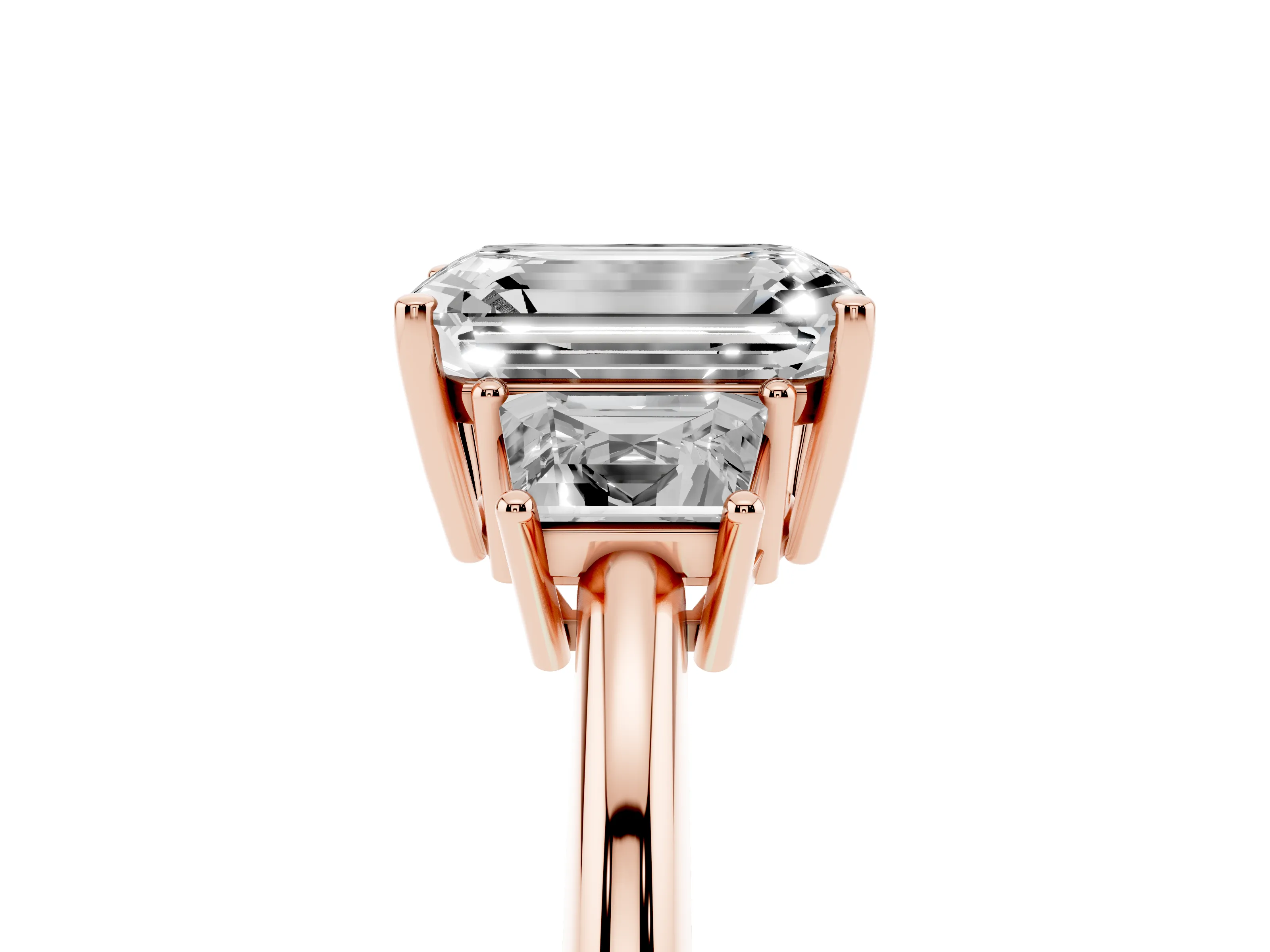 Emerald Cut Diamond Three-Stone Ring Set in Rose gold with Trapezoid Side Stones and Prong Setting