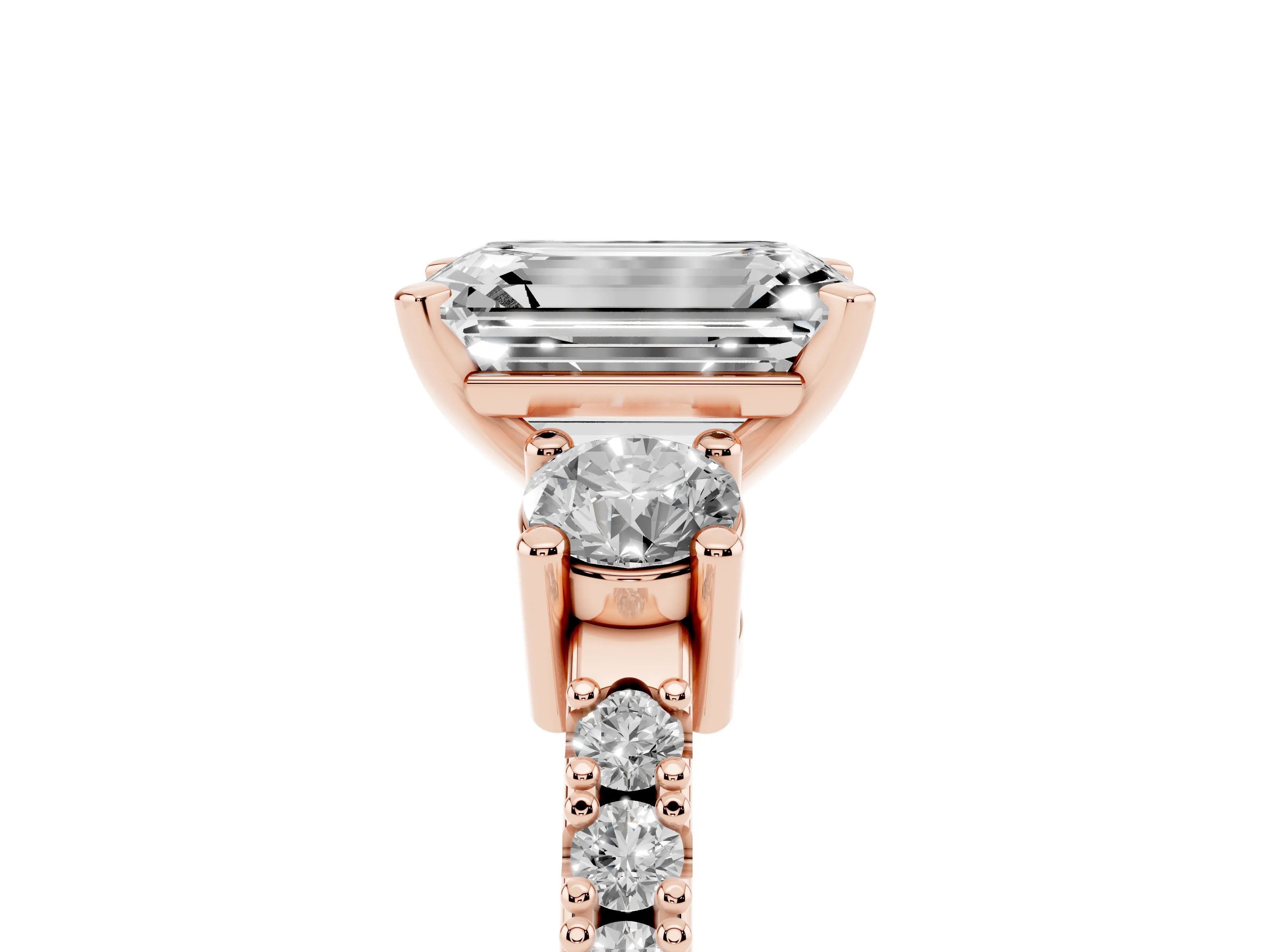 Three-Stone Emerald Cut Diamond Pavé Band Ring Set in Rose gold with Prong Setting