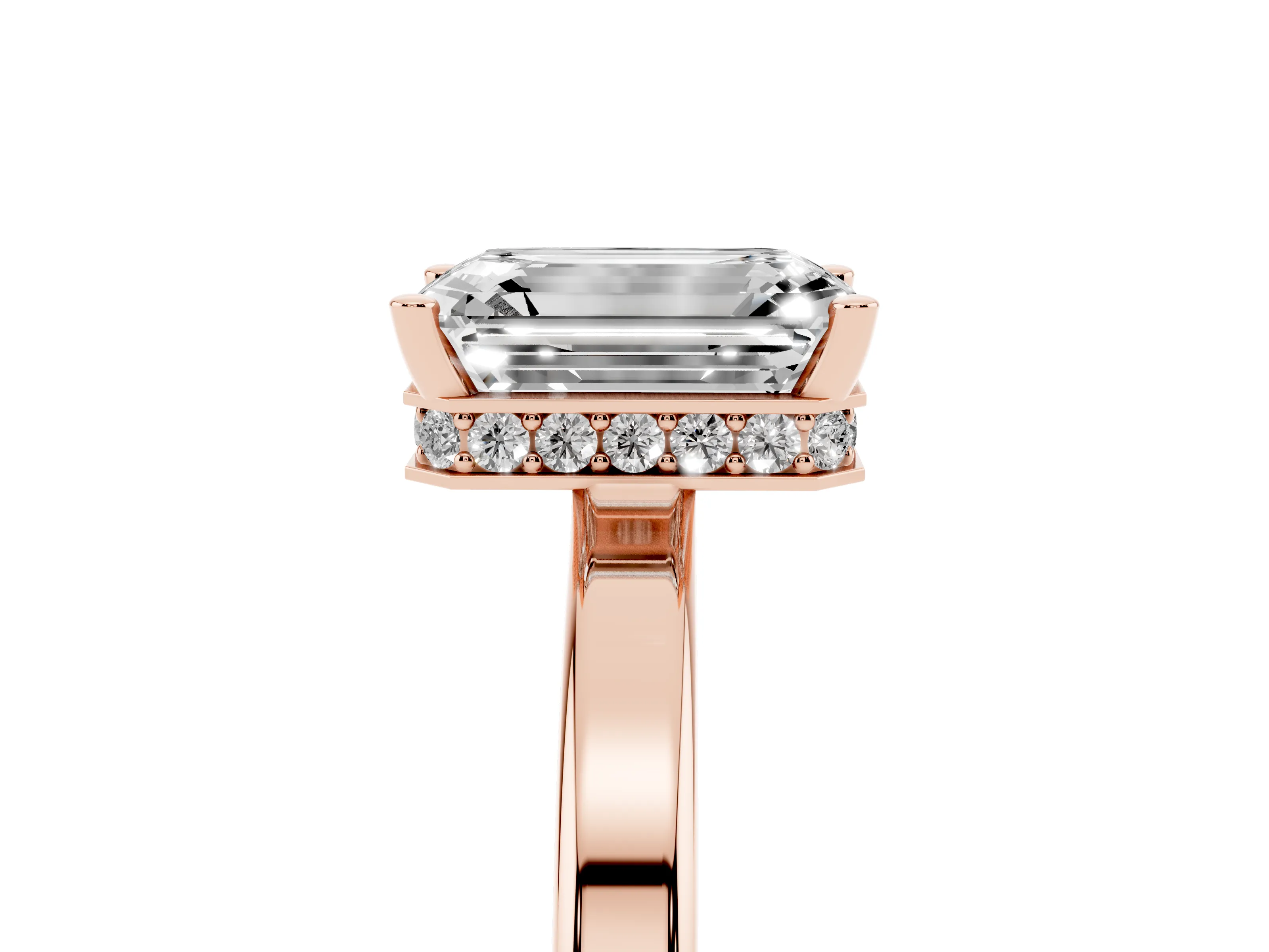 Emerald Cut Diamond Solitaire Engagement Ring Set in Rose gold with Prong Setting on a Plain Band