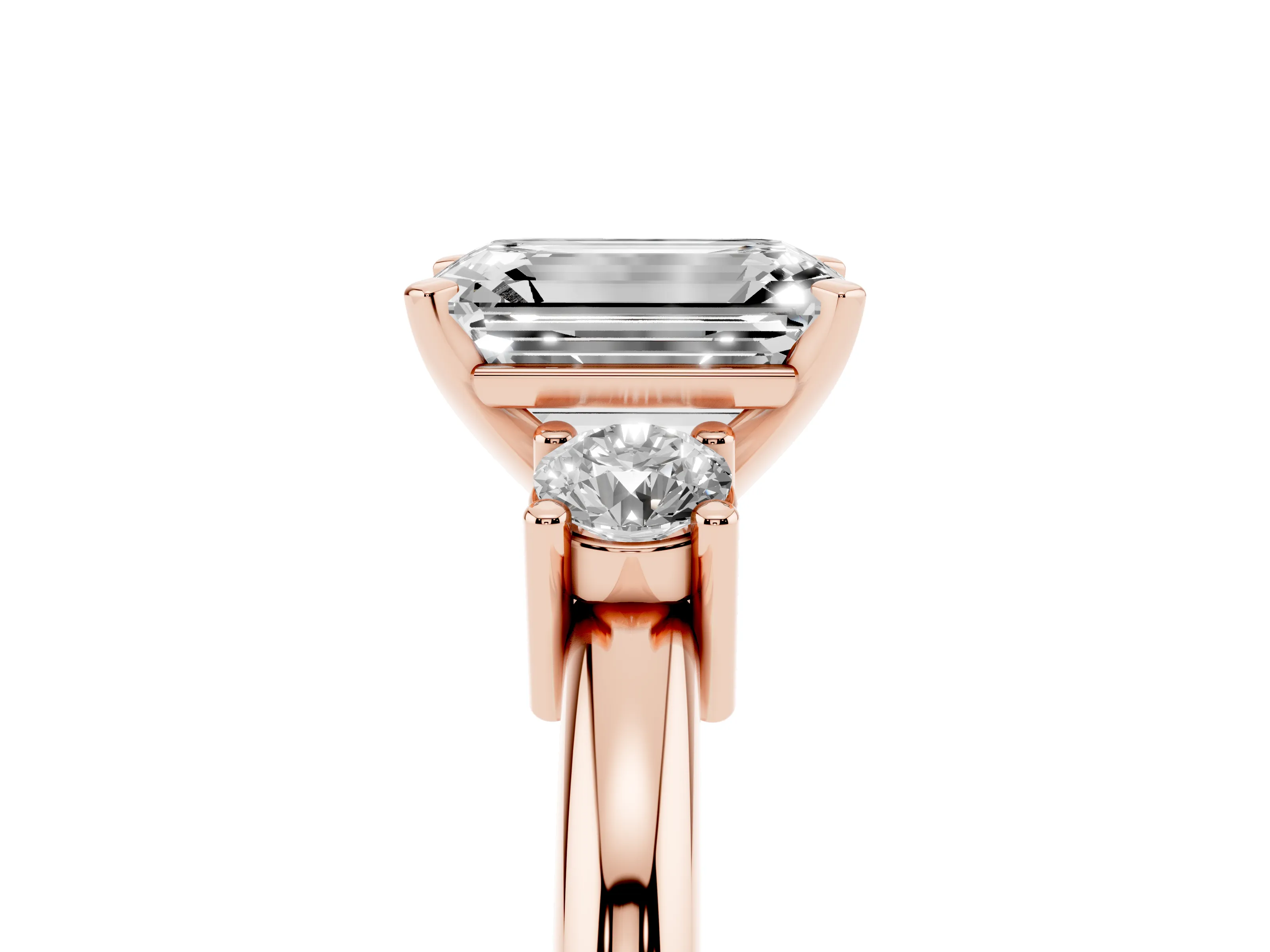 Three-Stone Emerald Cut Diamond Ring Set in Rose gold with Prong Setting and Plain Band