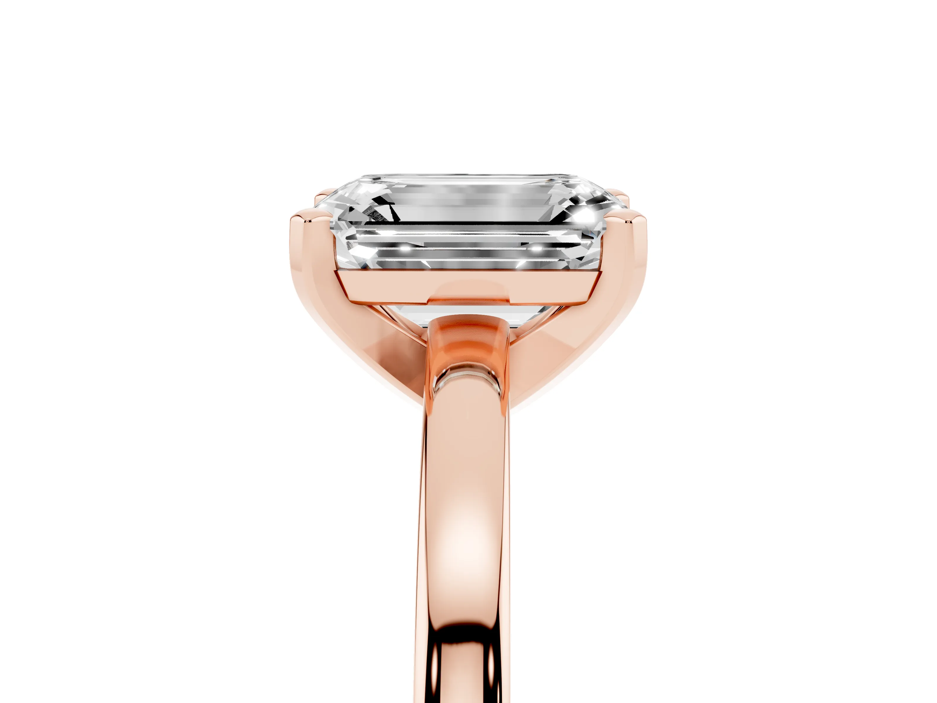 Emerald Cut Diamond Solitaire Engagement Ring Set in Rose gold with Prong Setting on a Classic Band