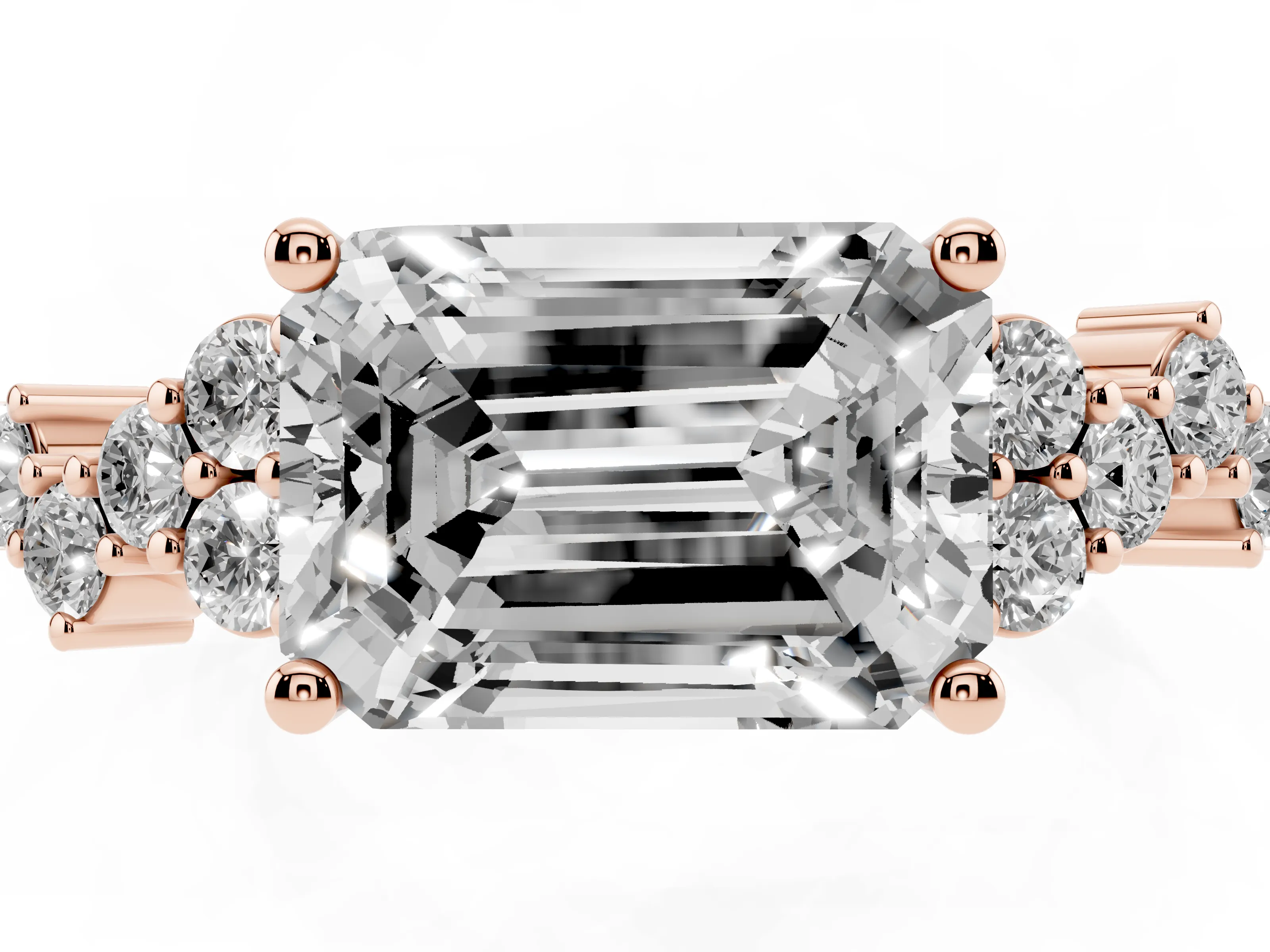 Emerald Cut Diamond Ring Set in Rose gold with Scattered Round Accents