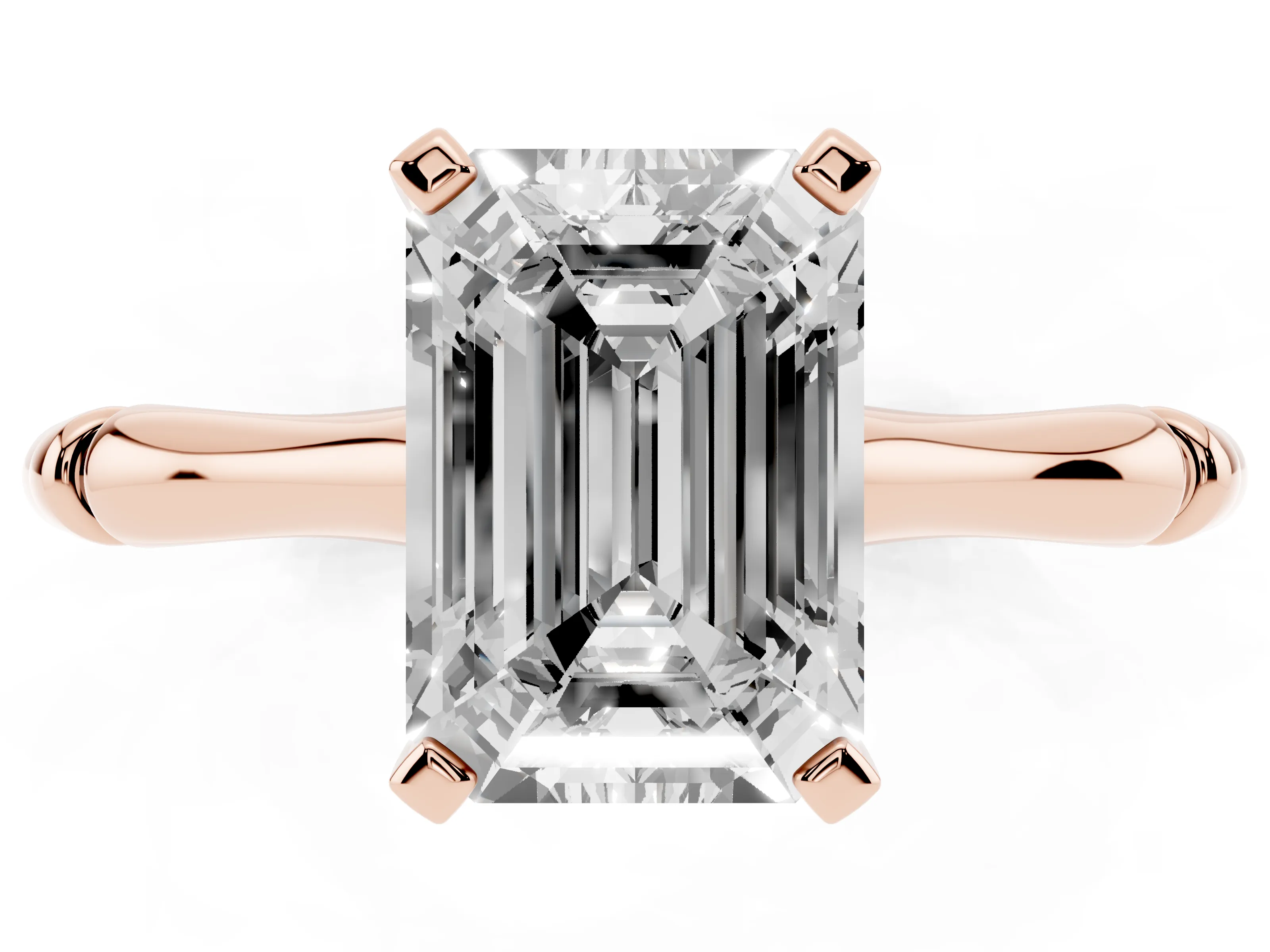 Emerald Cut Diamond Solitaire Ring Set in Rose gold with Bamboo Band and Prong Setting