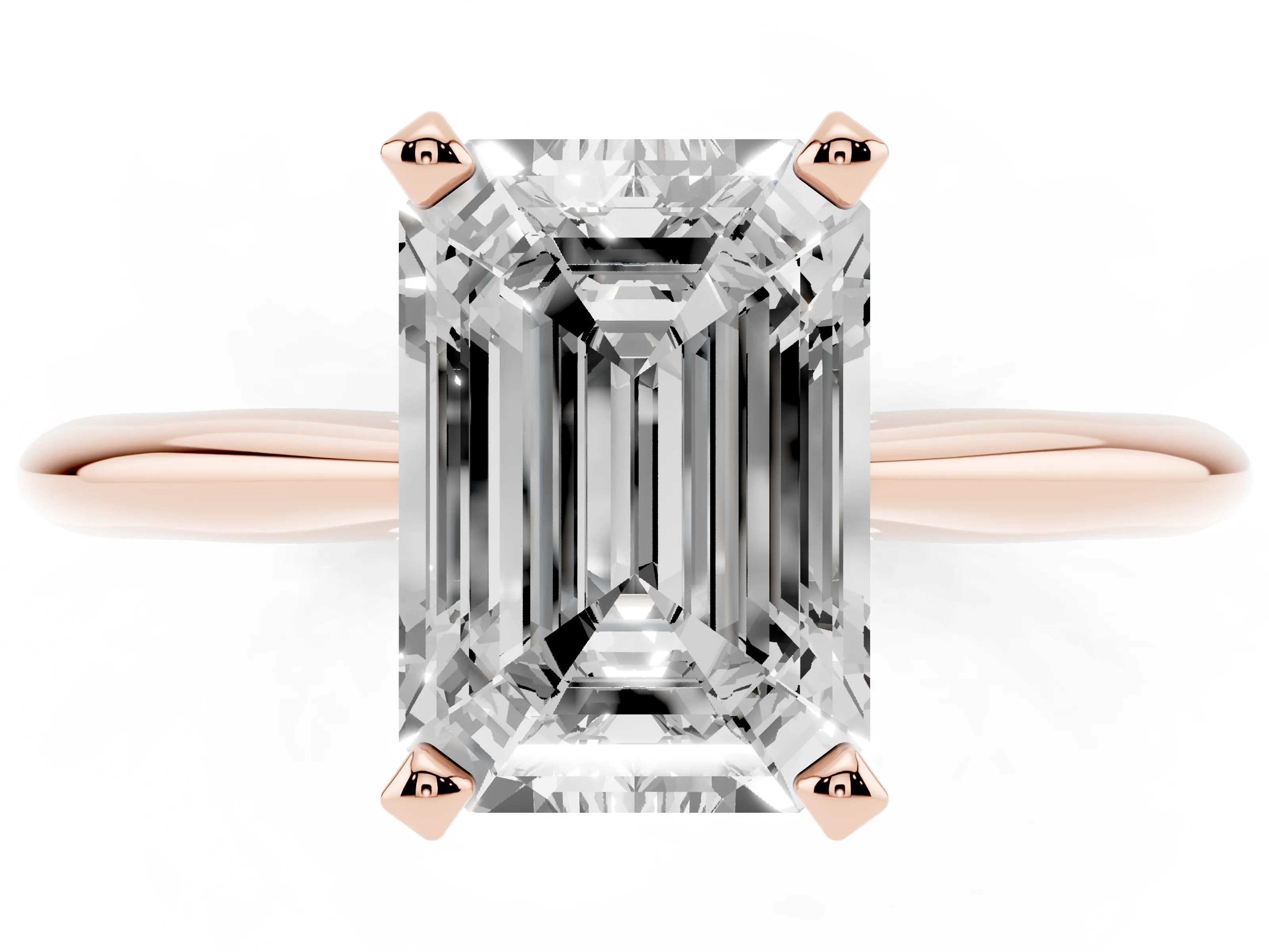 Emerald Cut Diamond Solitaire Ring Set in Rose gold with Prong Setting on a Plain Round Band