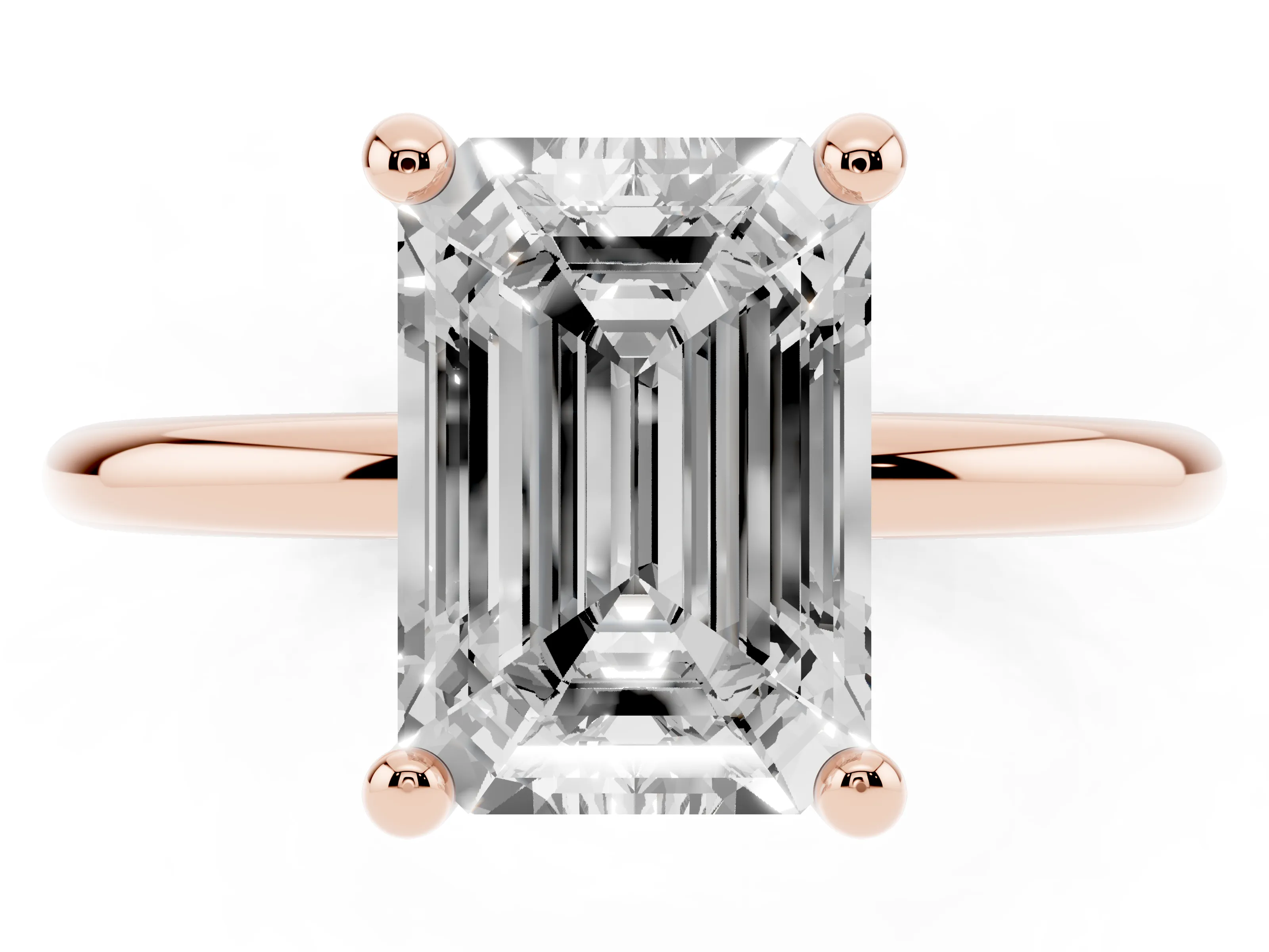 Emerald Cut Diamond Solitaire Ring Set in Rose gold with Secure Prong Setting on a Classic Band